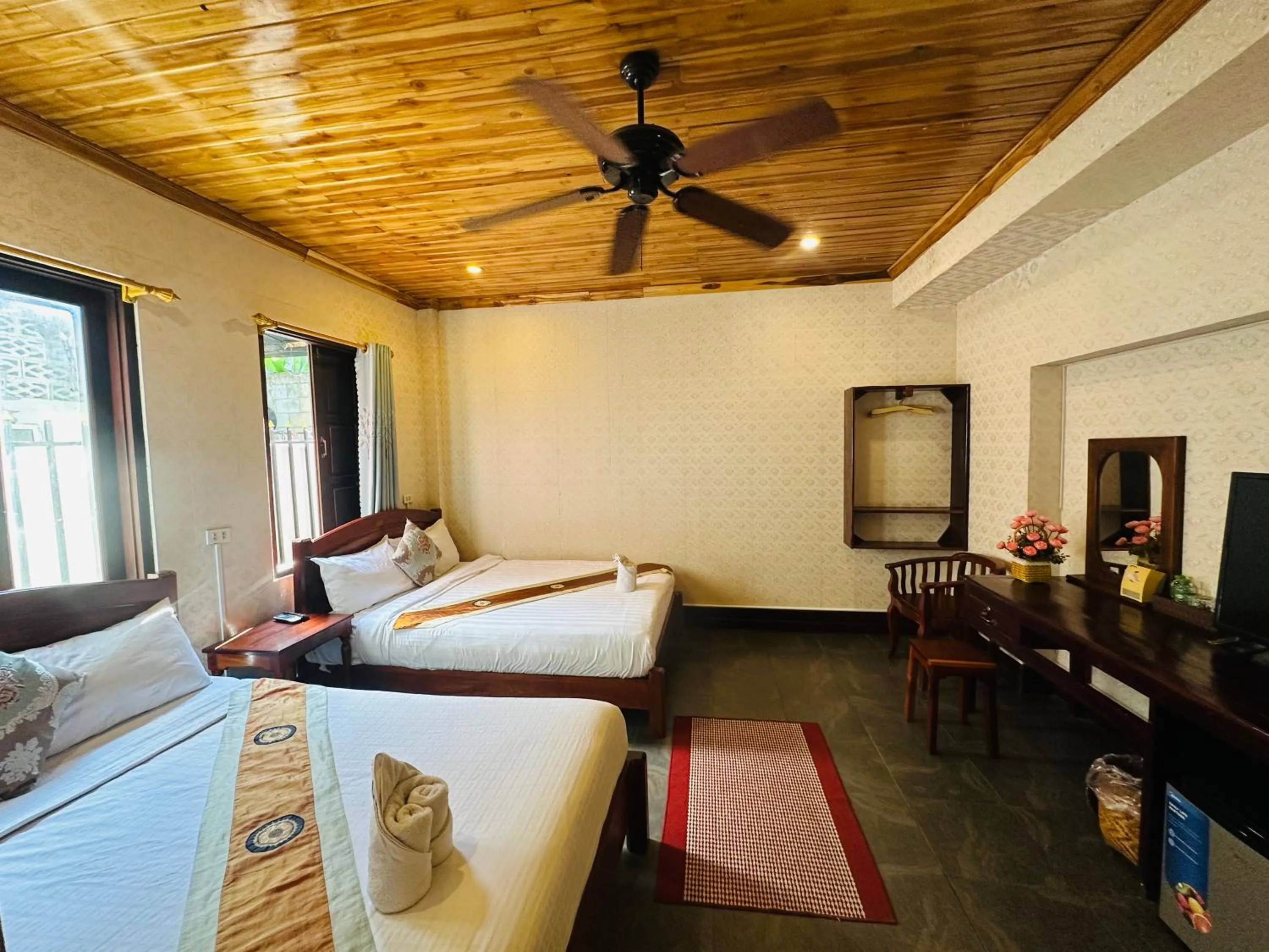 Bed in Anisa Mekong Riverside Villa