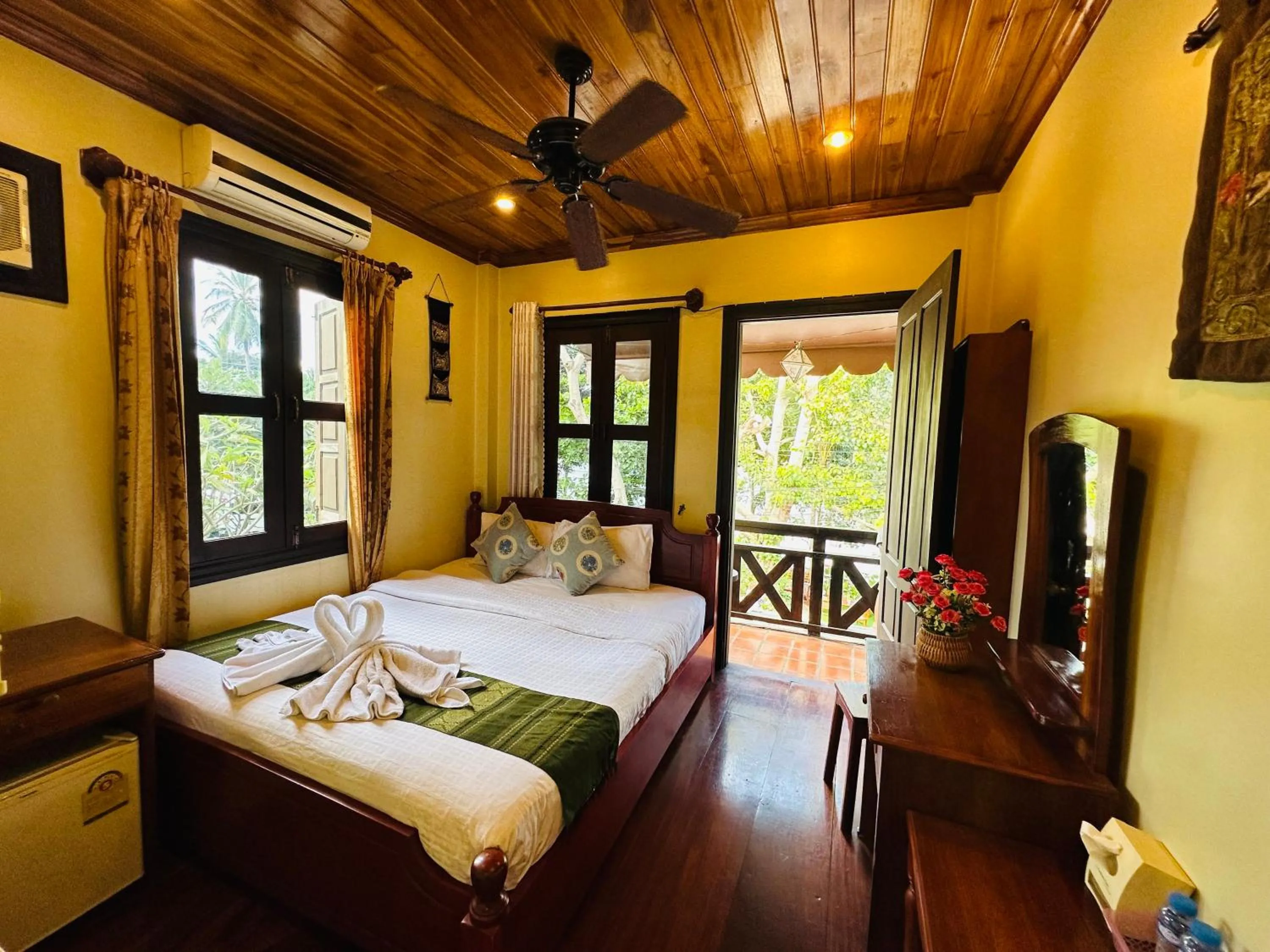 Bed in Anisa Mekong Riverside Villa