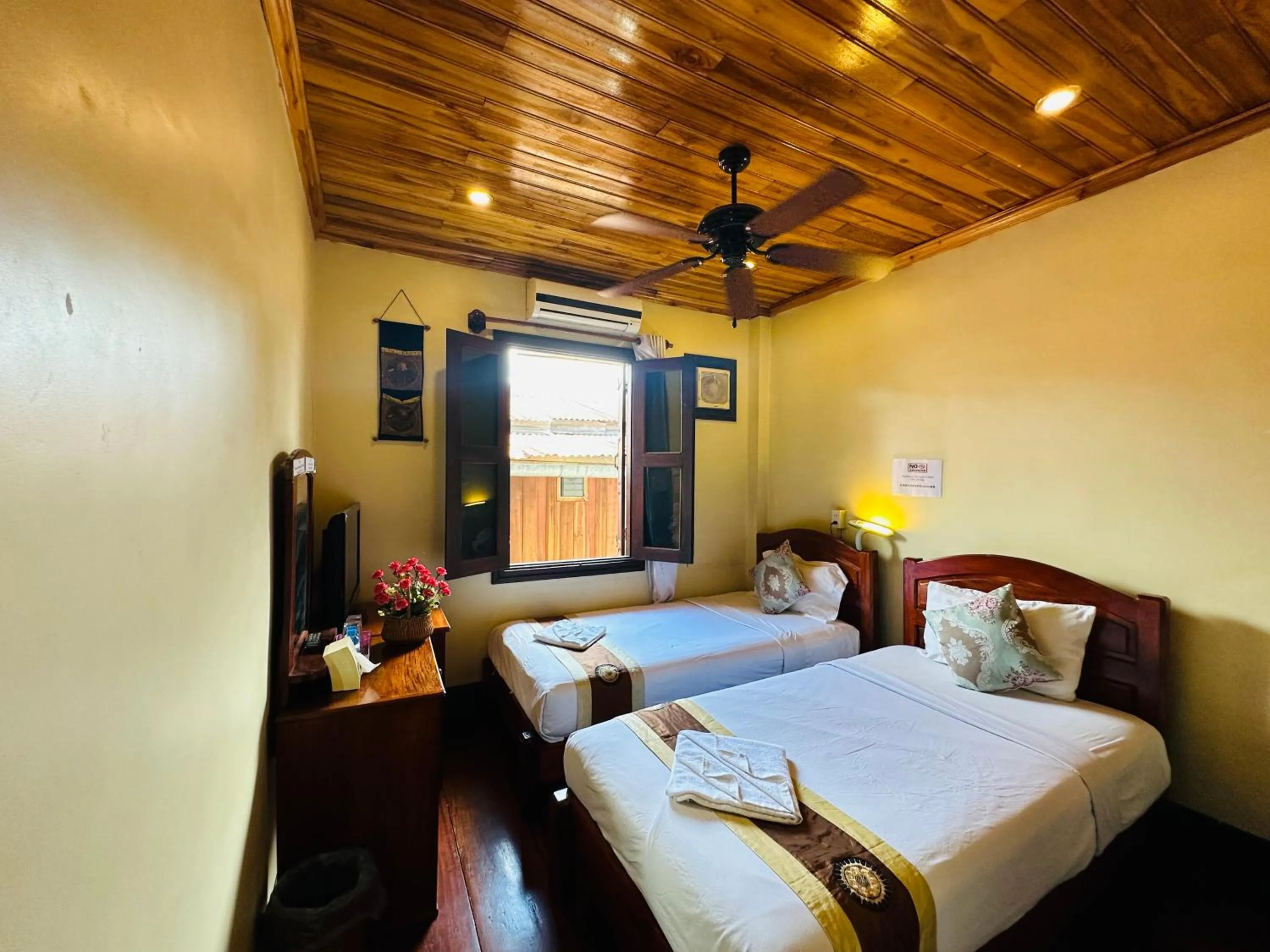 Bed in Anisa Mekong Riverside Villa