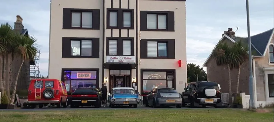 Property building in Cadillac Kustomz Guest House