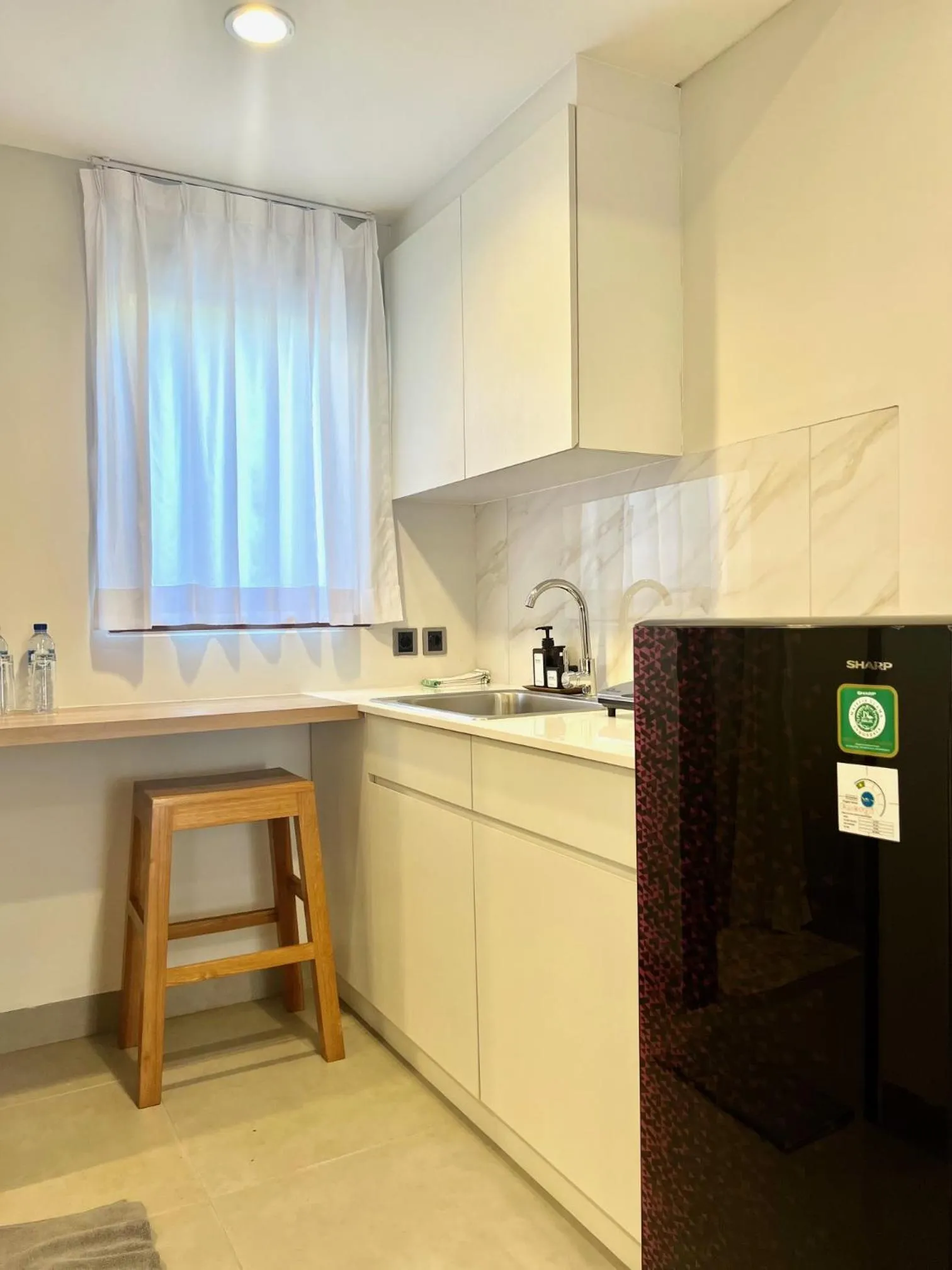 Kitchen or kitchenette in Charlie Guest House
