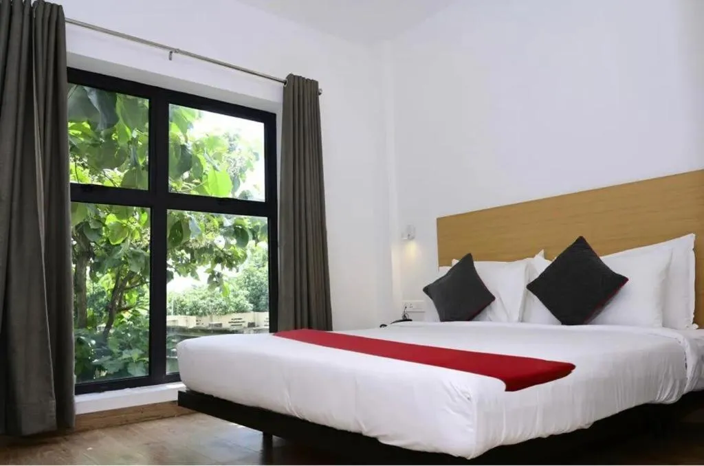 Bed in SM Hives Business Hotel