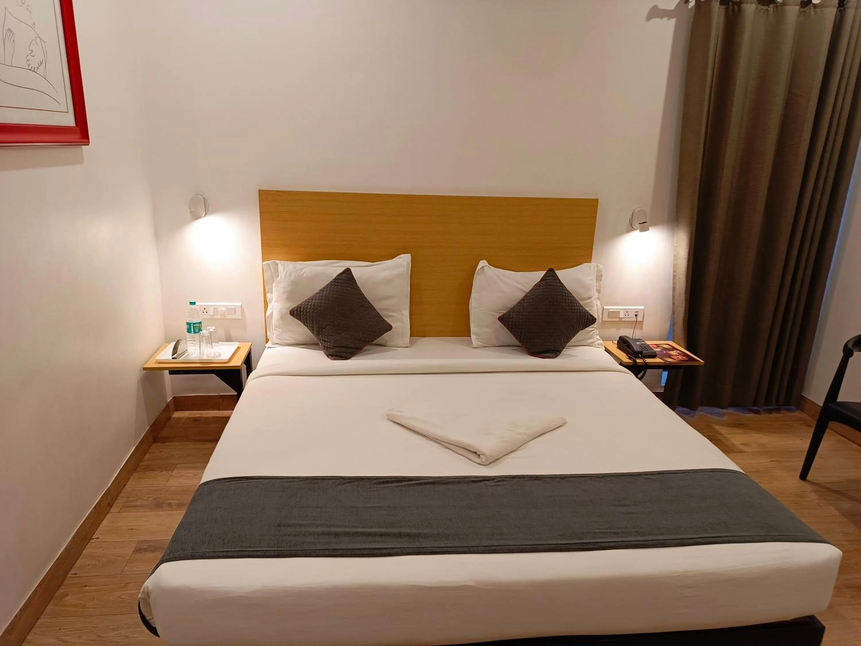 Bed in SM Hives Business Hotel