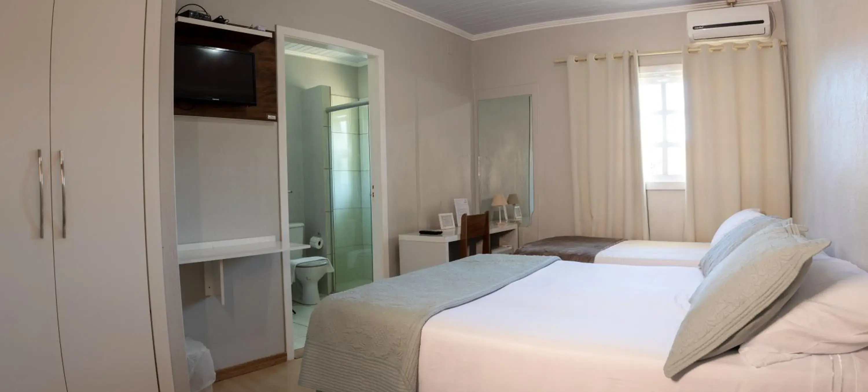 Triple Room in Pousada Boschetti Triple Room in Pousada Boschetti