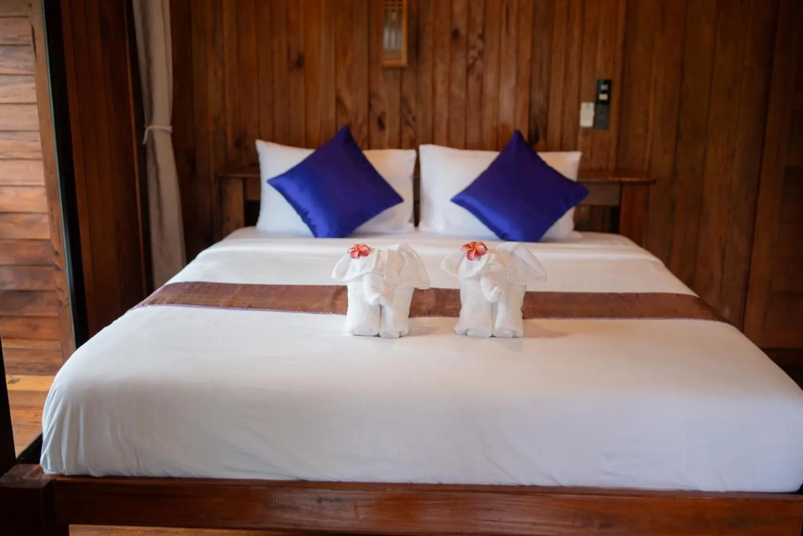 Bed in COCO Canopy Boutique Resort