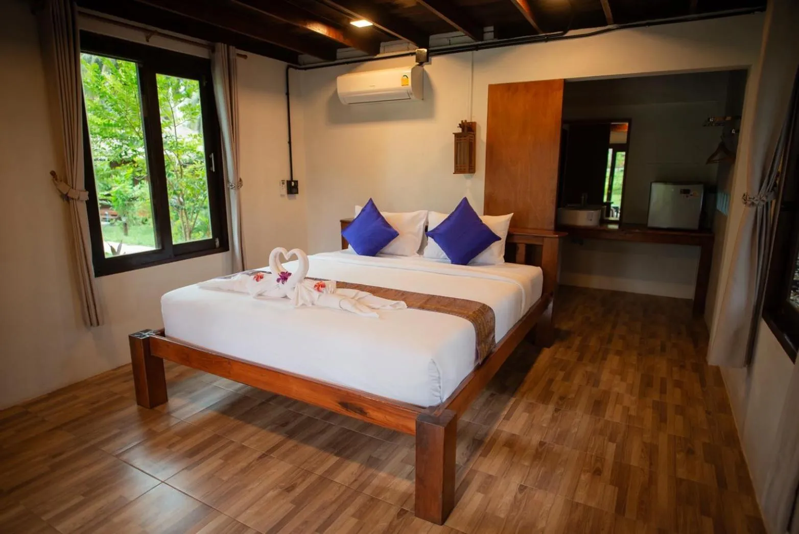 Bed in COCO Canopy Boutique Resort