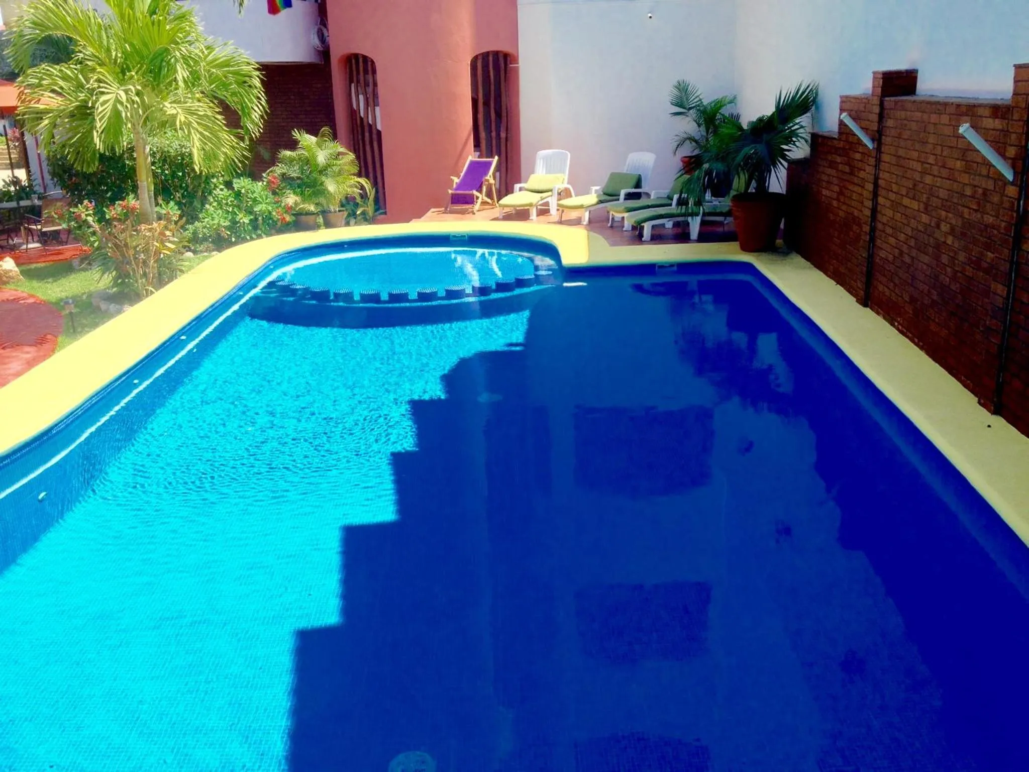 Swimming pool in Hotel y Suites Los Encantos