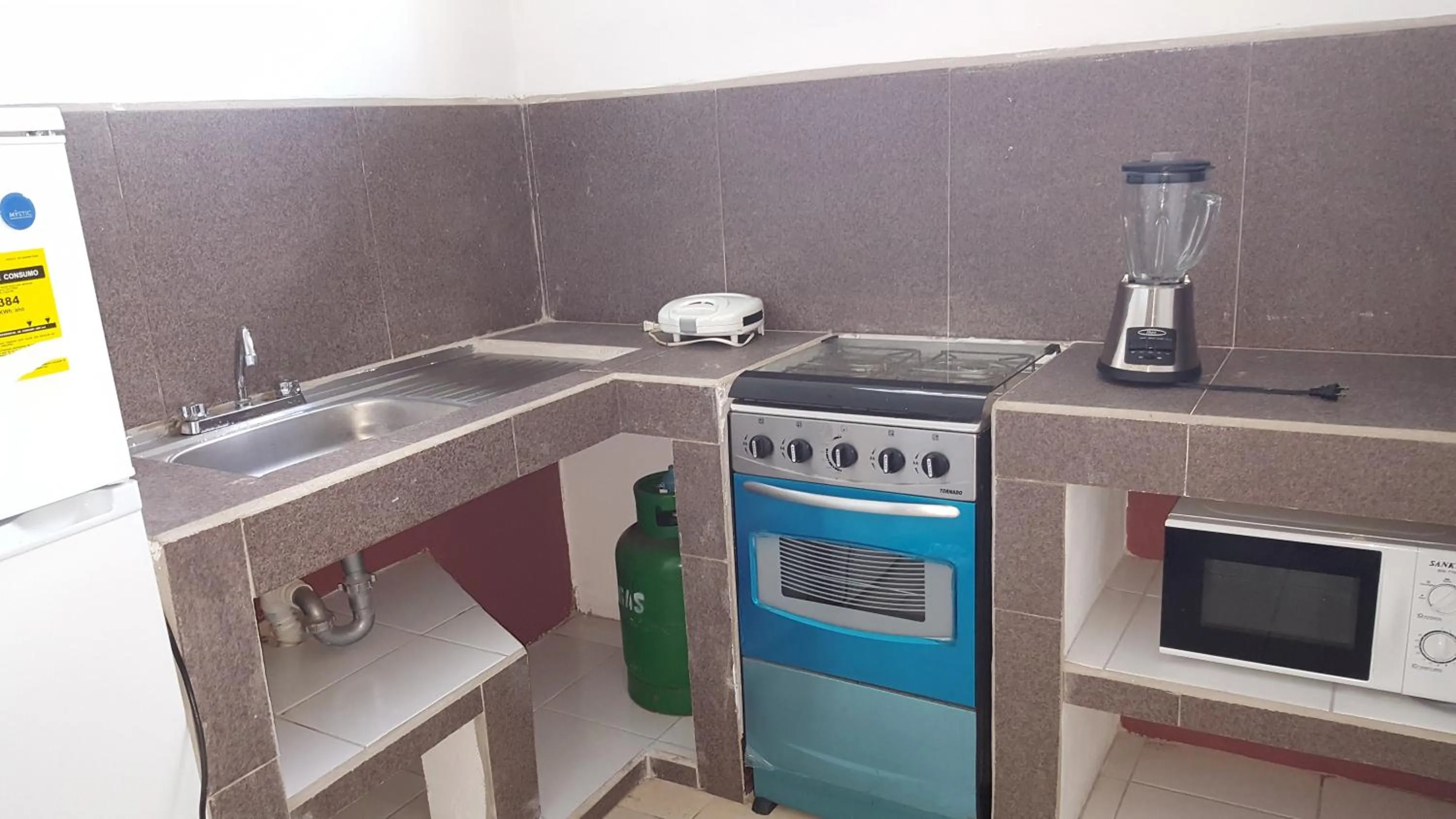 Kitchen or kitchenette in Hotel La Arboleda