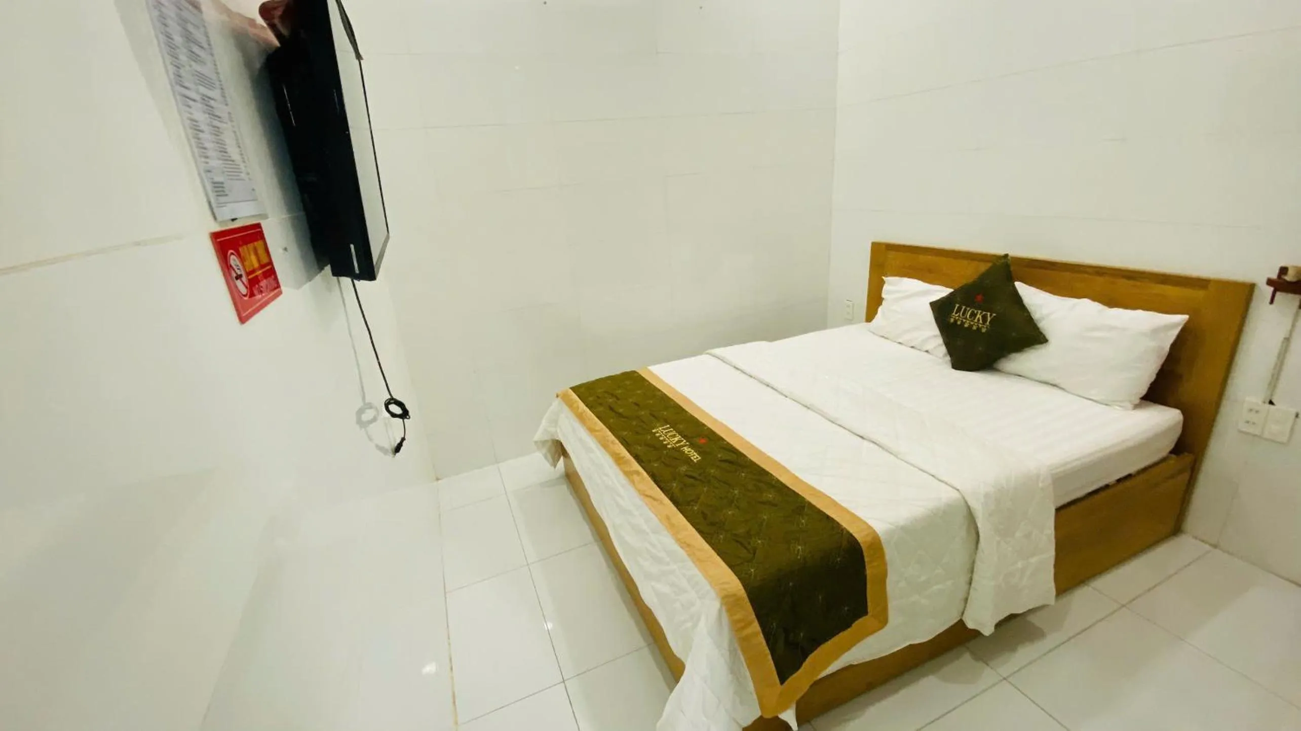 Bed in LUCKY HOTEL LIEN PHUONG