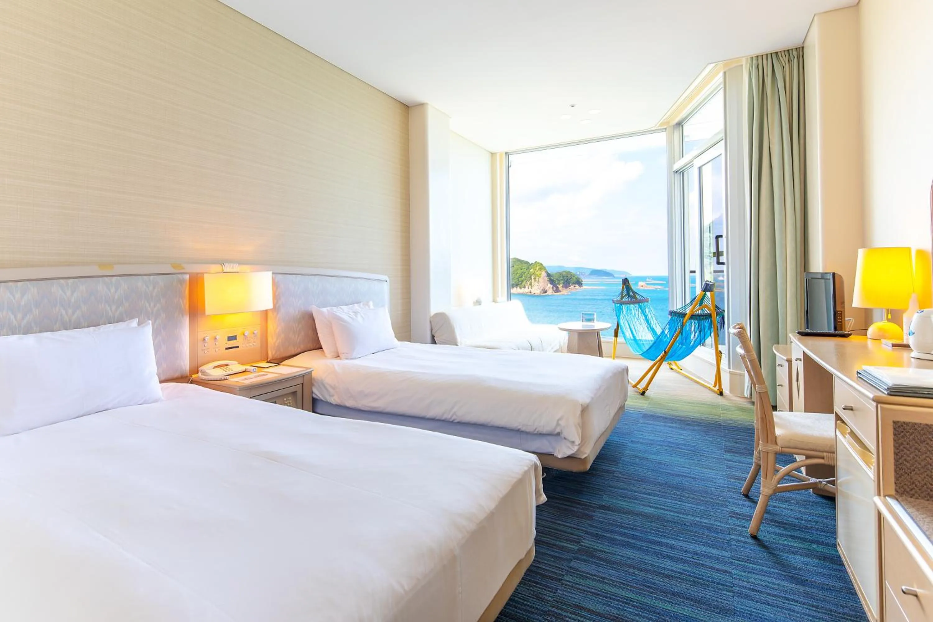 Bed in Nichinankaigan Nango Prince Hotel