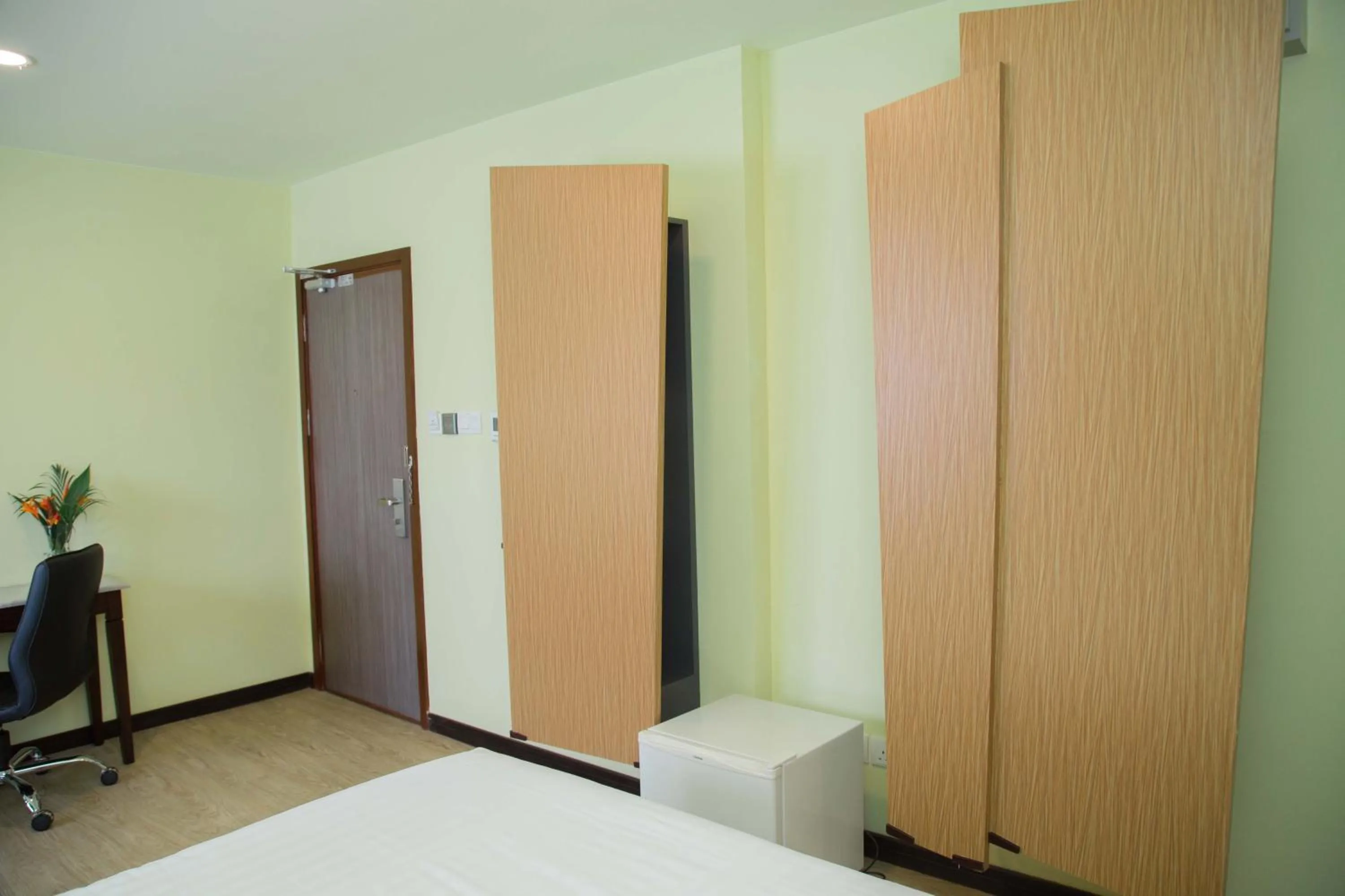 Bed in The Capital Residence Suites