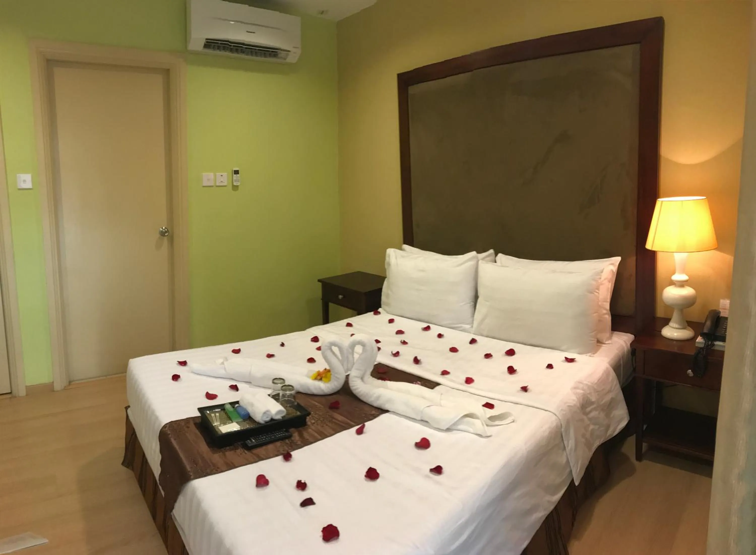 Bed in The Capital Residence Suites