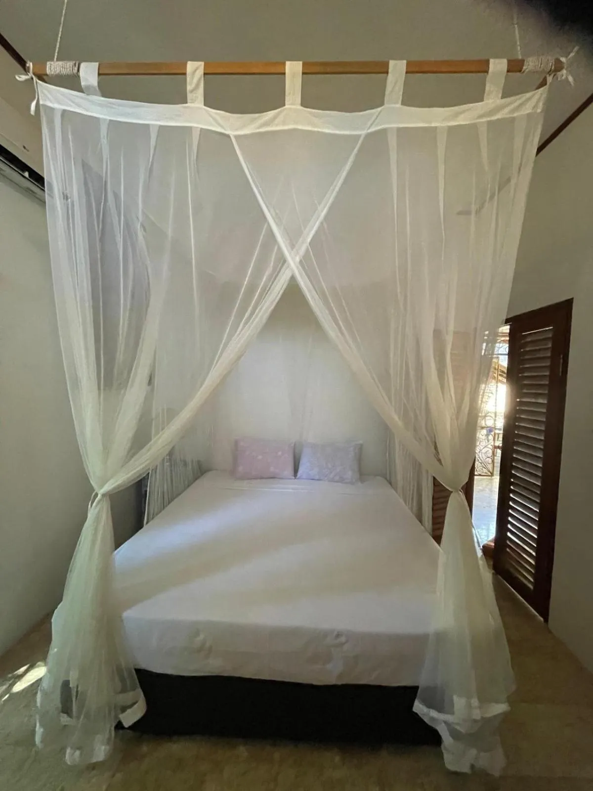 Bed in Elephant House and Bungalows Gili Air