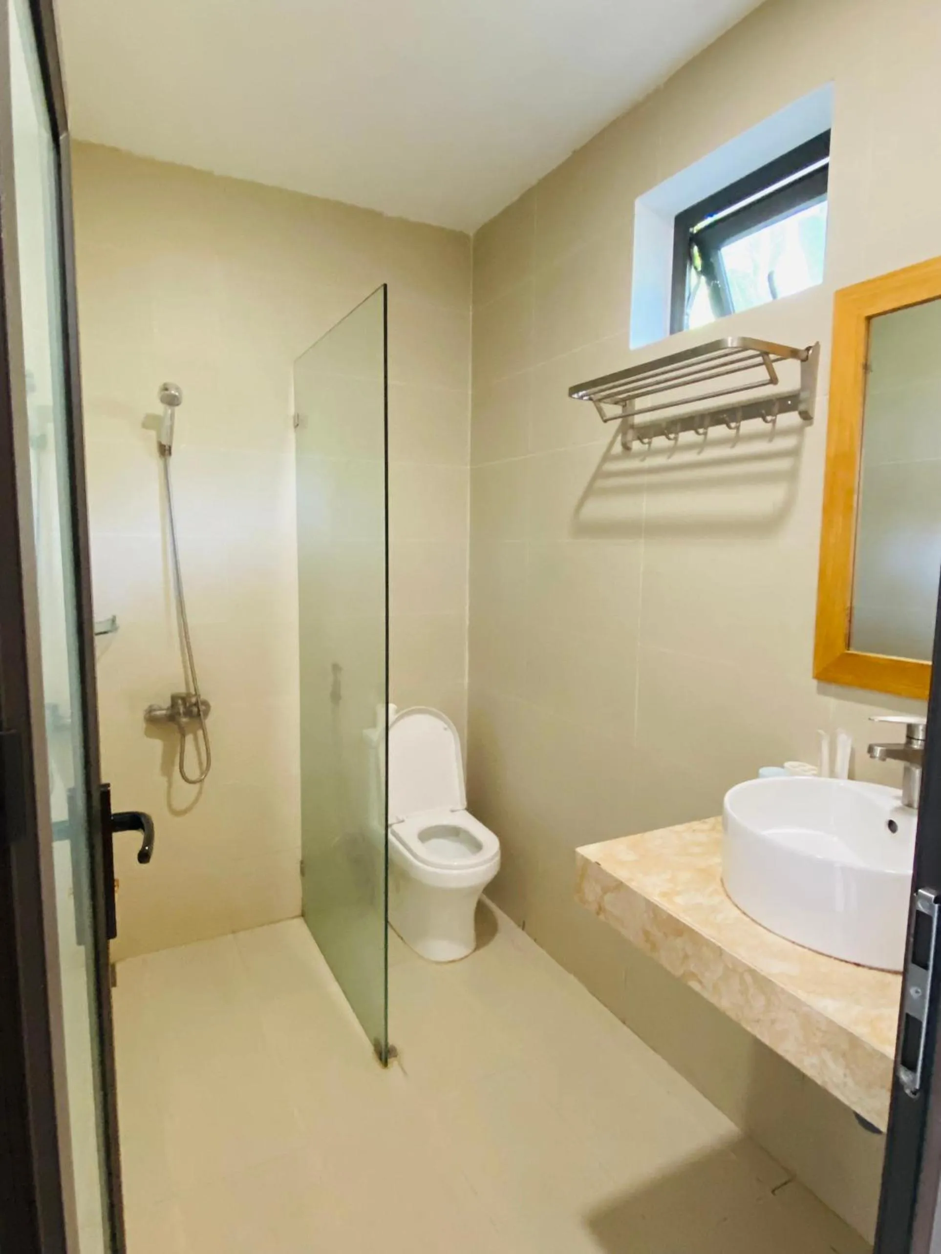 Shower in ARECA MUINE HOMESTAY