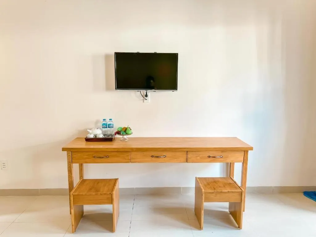 TV and multimedia in ARECA MUINE HOMESTAY