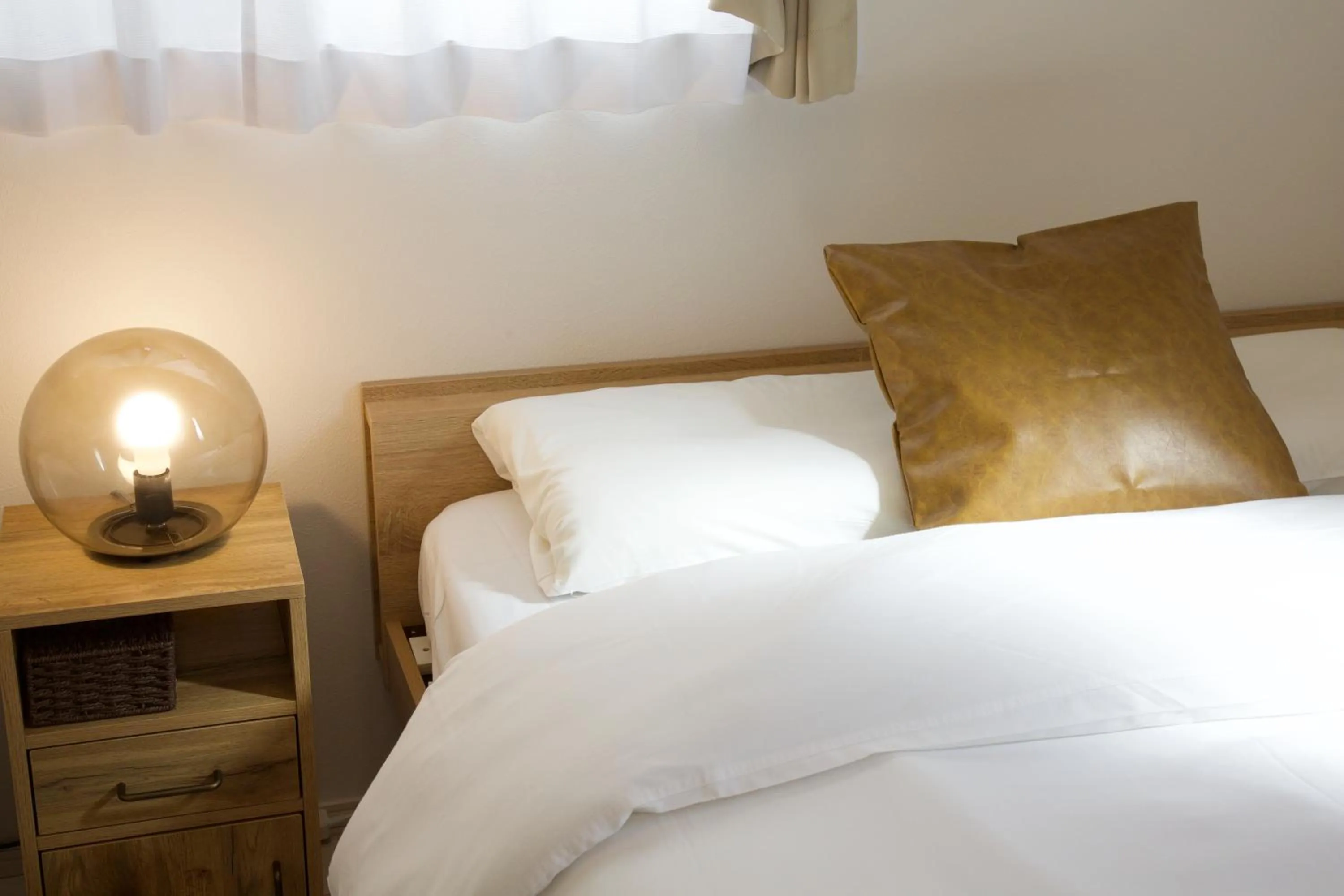 Bed in FINOA Residential Suite Kameari