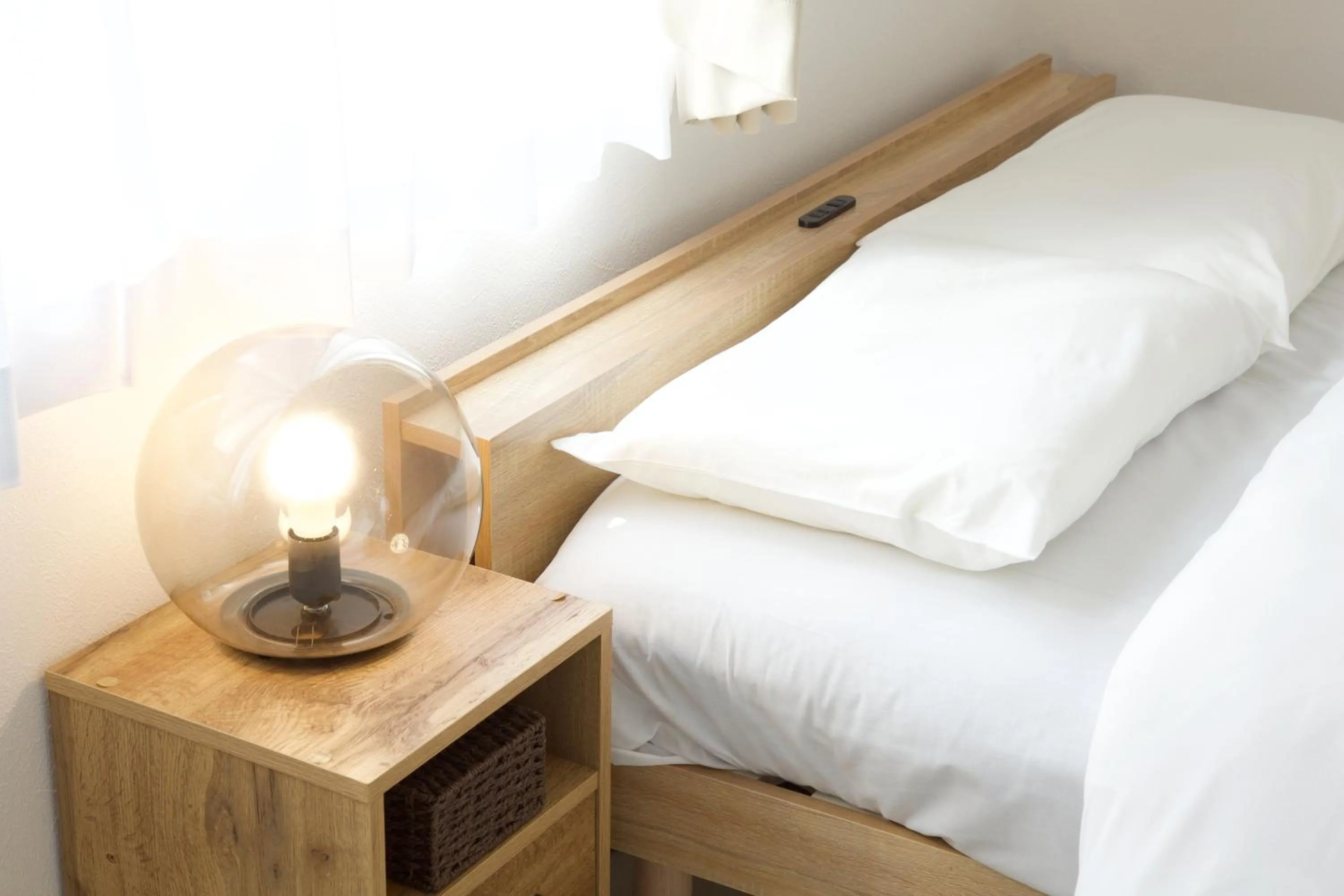 Bed in FINOA Residential Suite Kameari