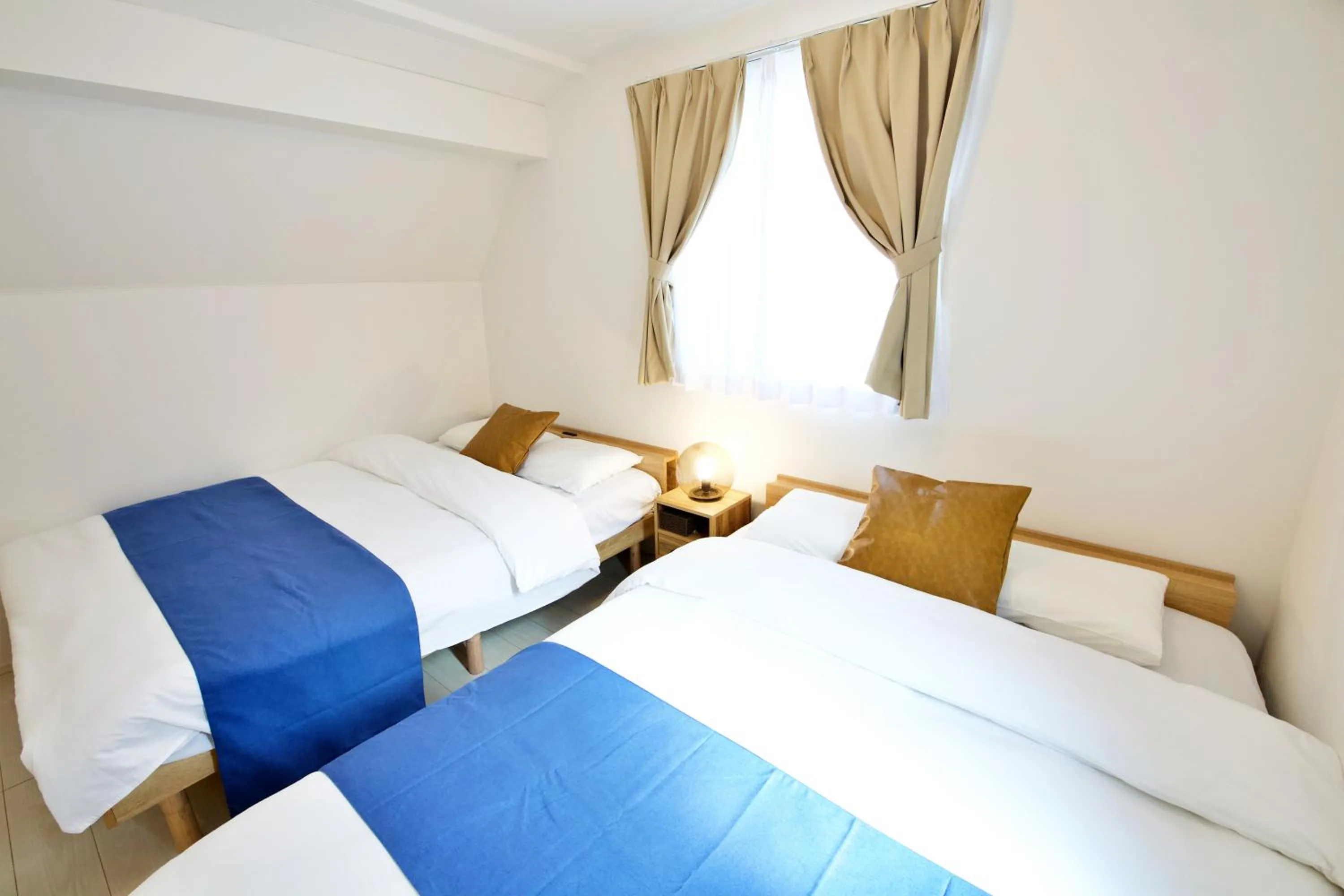 Bed in FINOA Residential Suite Kameari