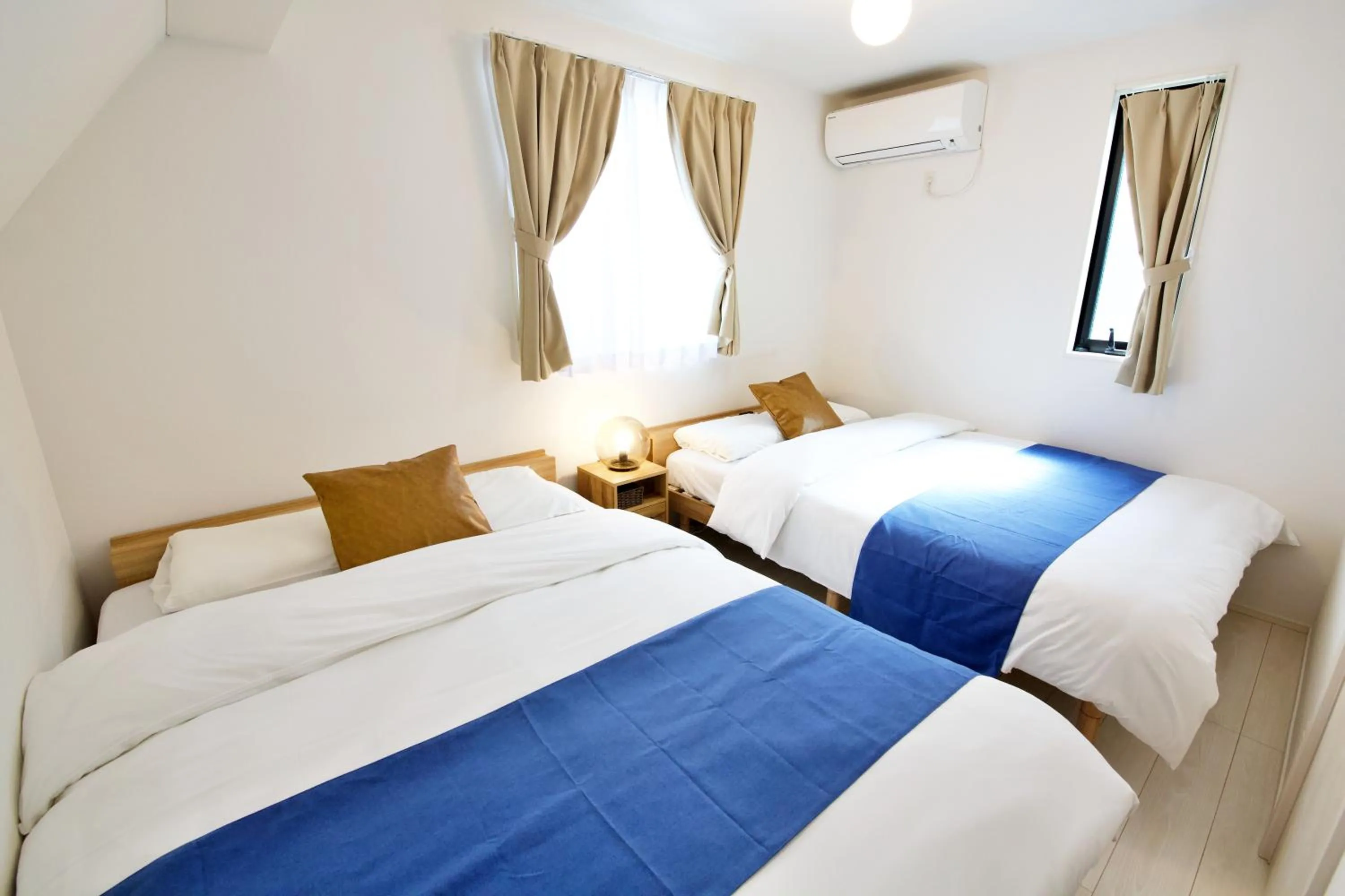 Bed in FINOA Residential Suite Kameari