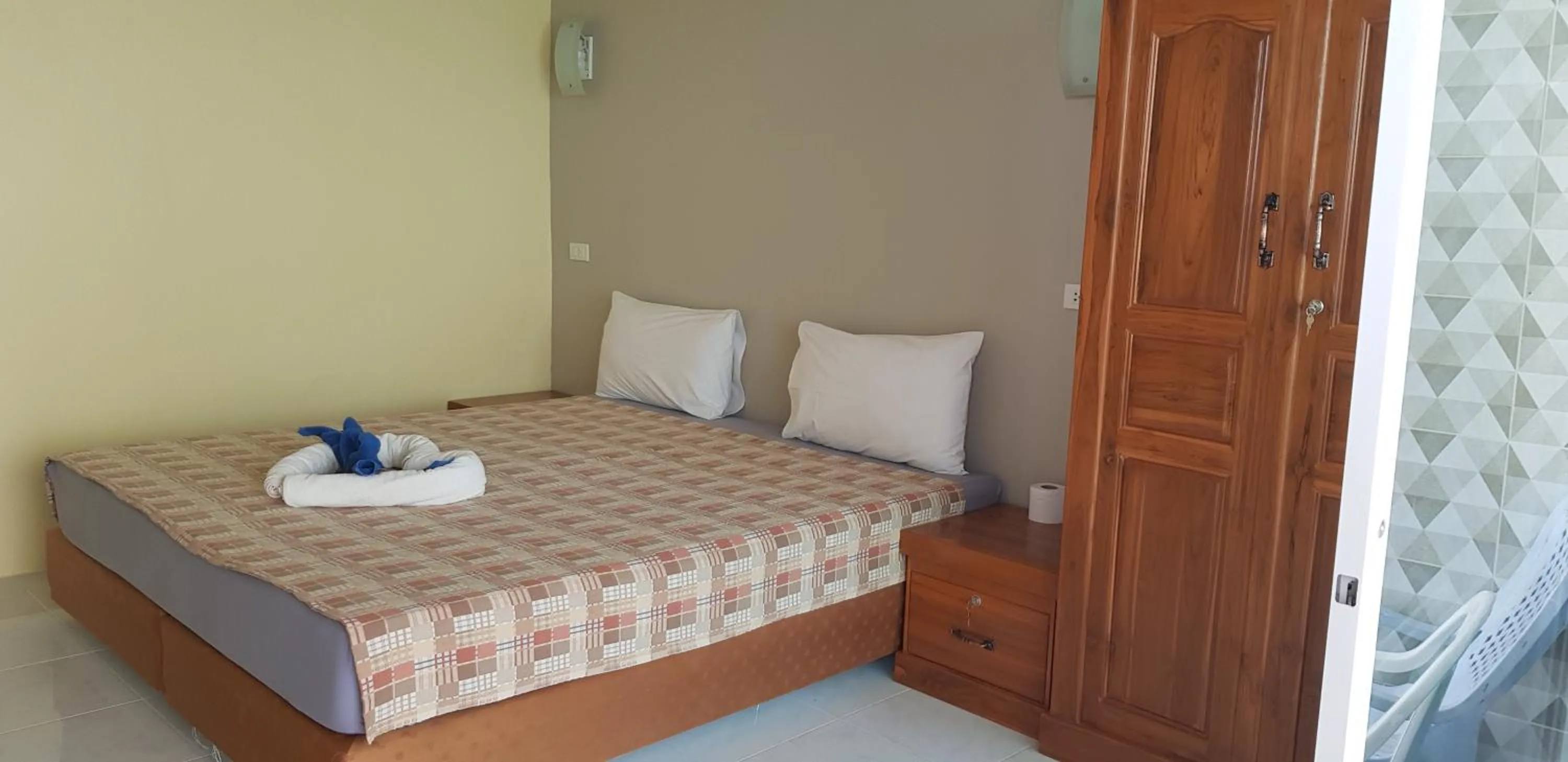 Bed in Black Coffee Village