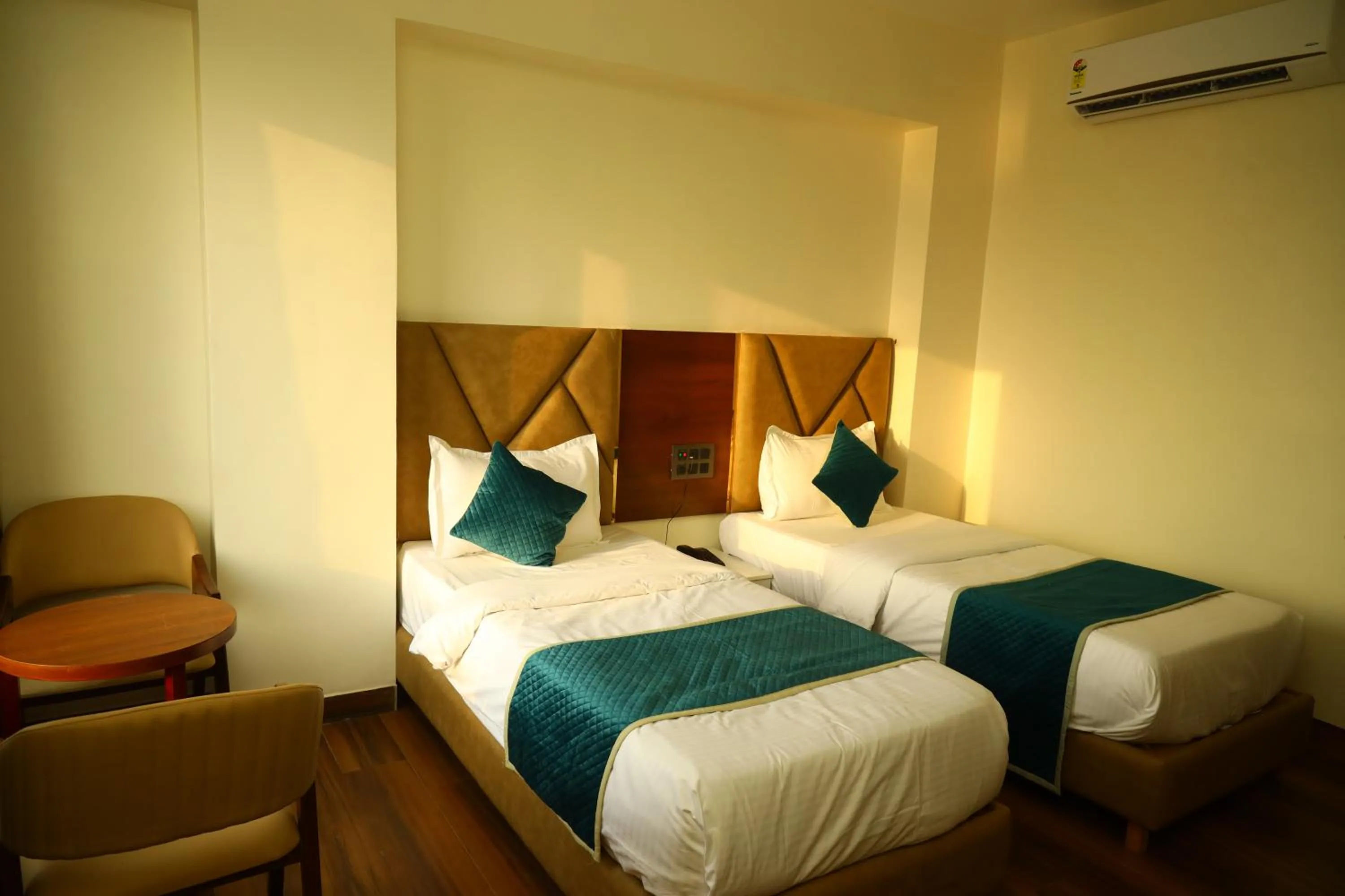 Bedroom in The Imperial By Vinayak Hotels