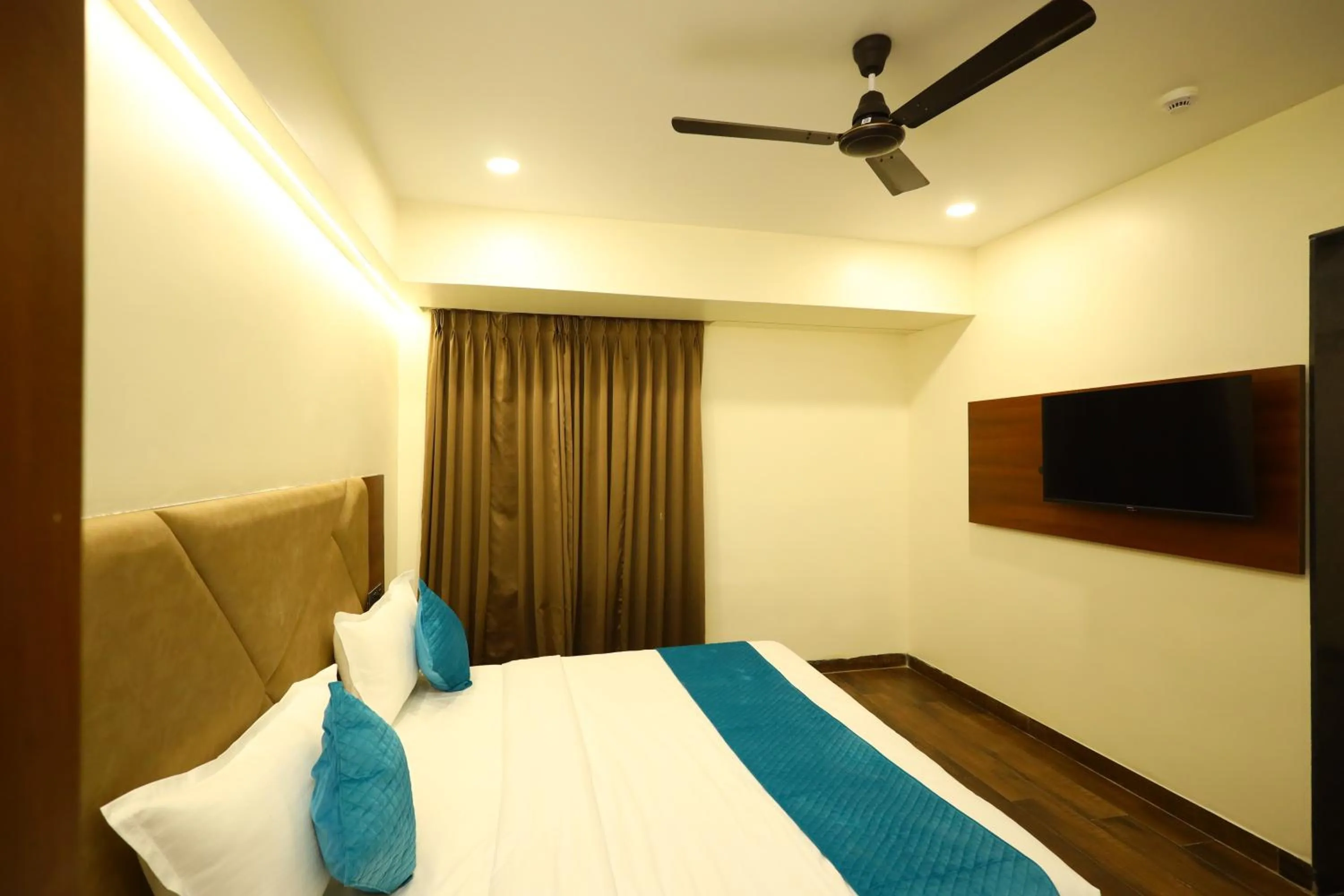 Bedroom in The Imperial By Vinayak Hotels