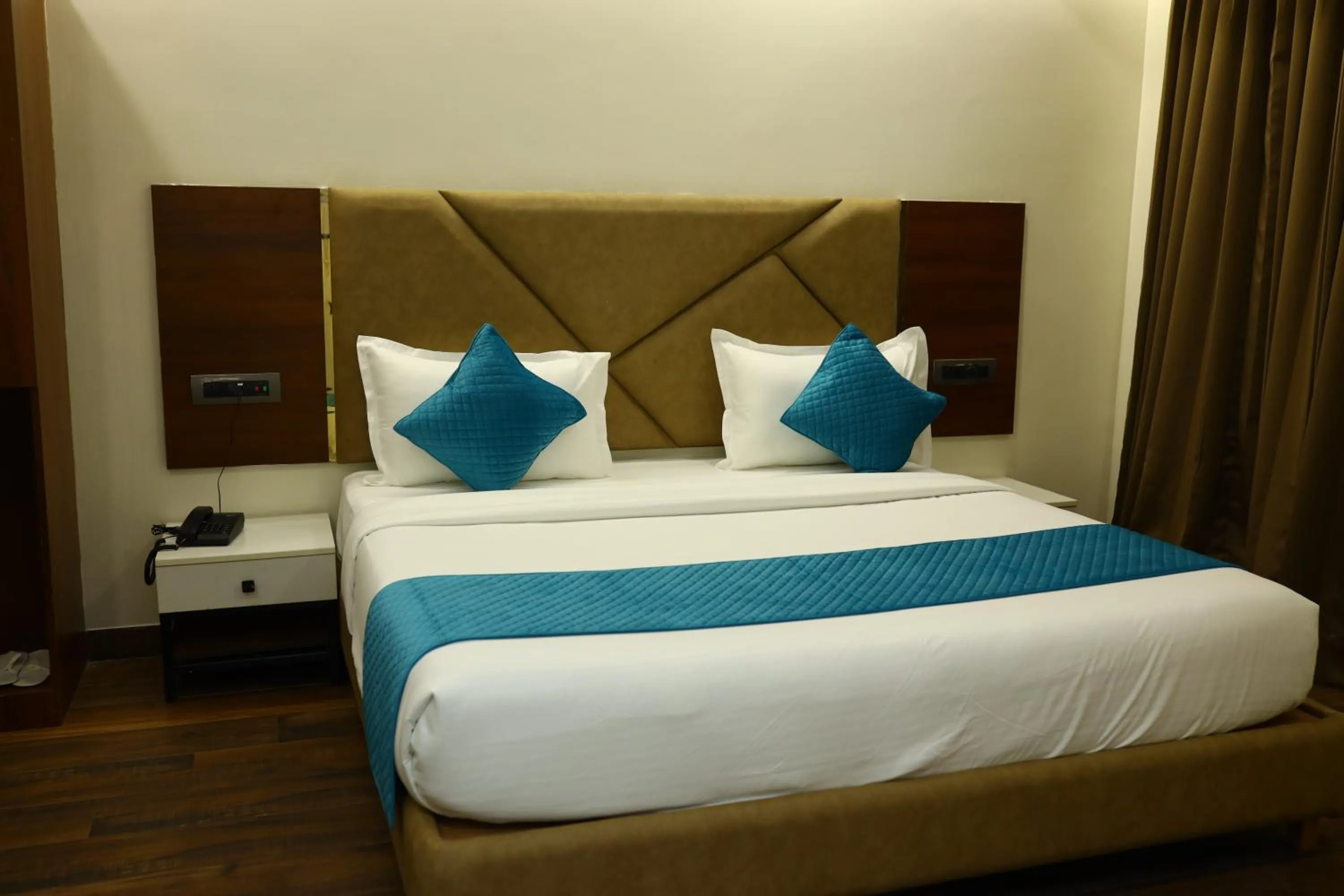 Bed in The Imperial By Vinayak Hotels