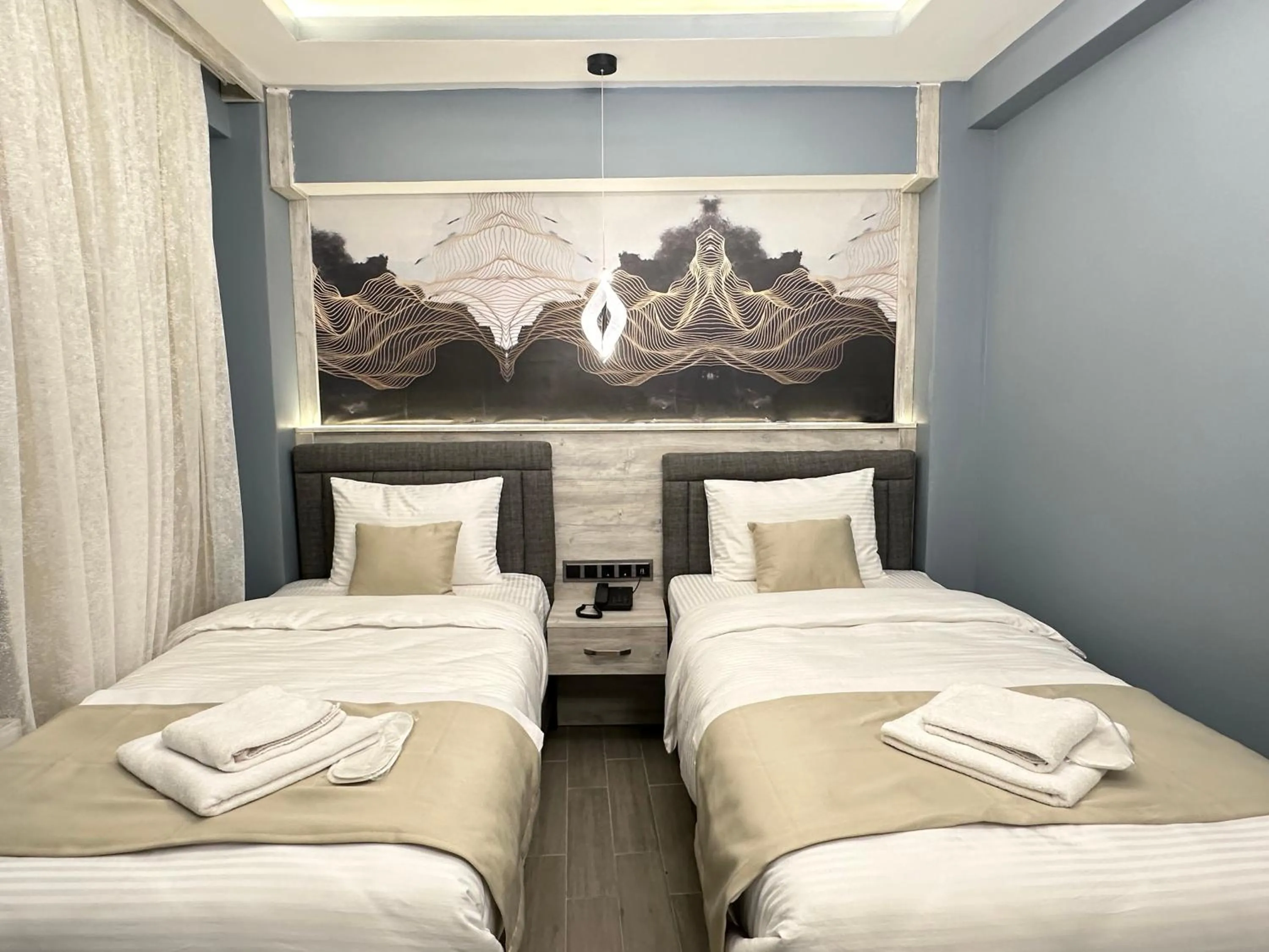 Bed in Blue Moonrise Hotel