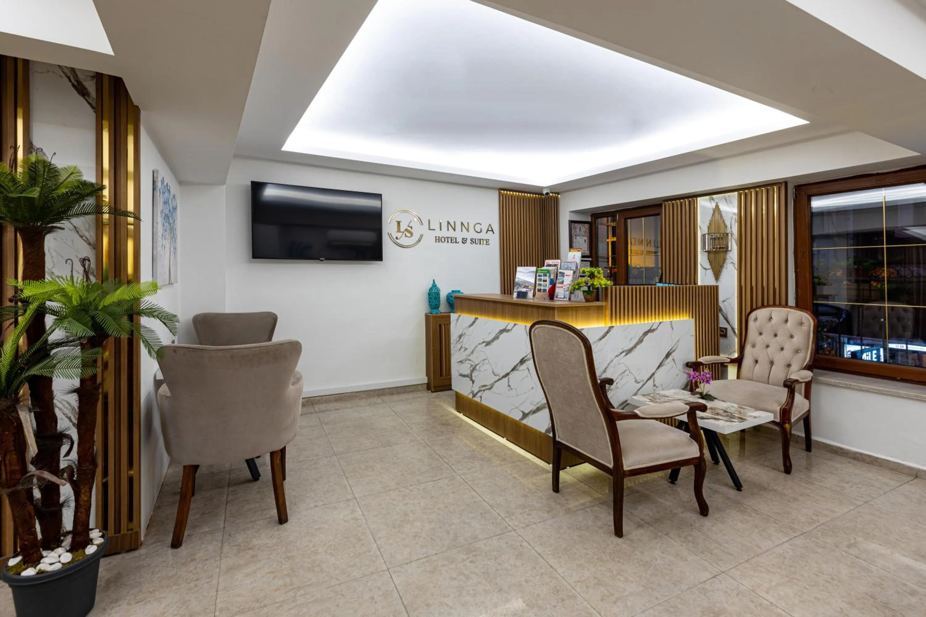 Lobby or reception in LINNGA HOTEL & SUITE