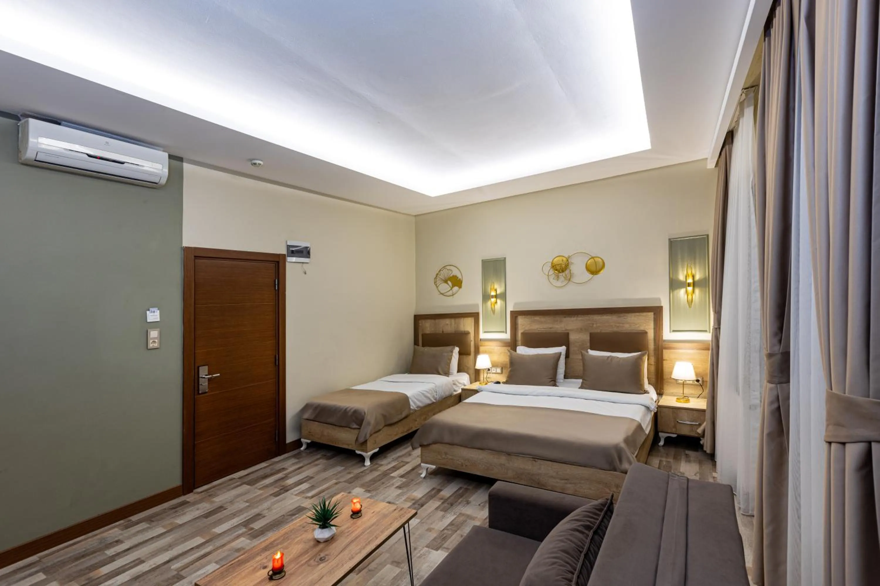 Bed in LINNGA HOTEL & SUITE