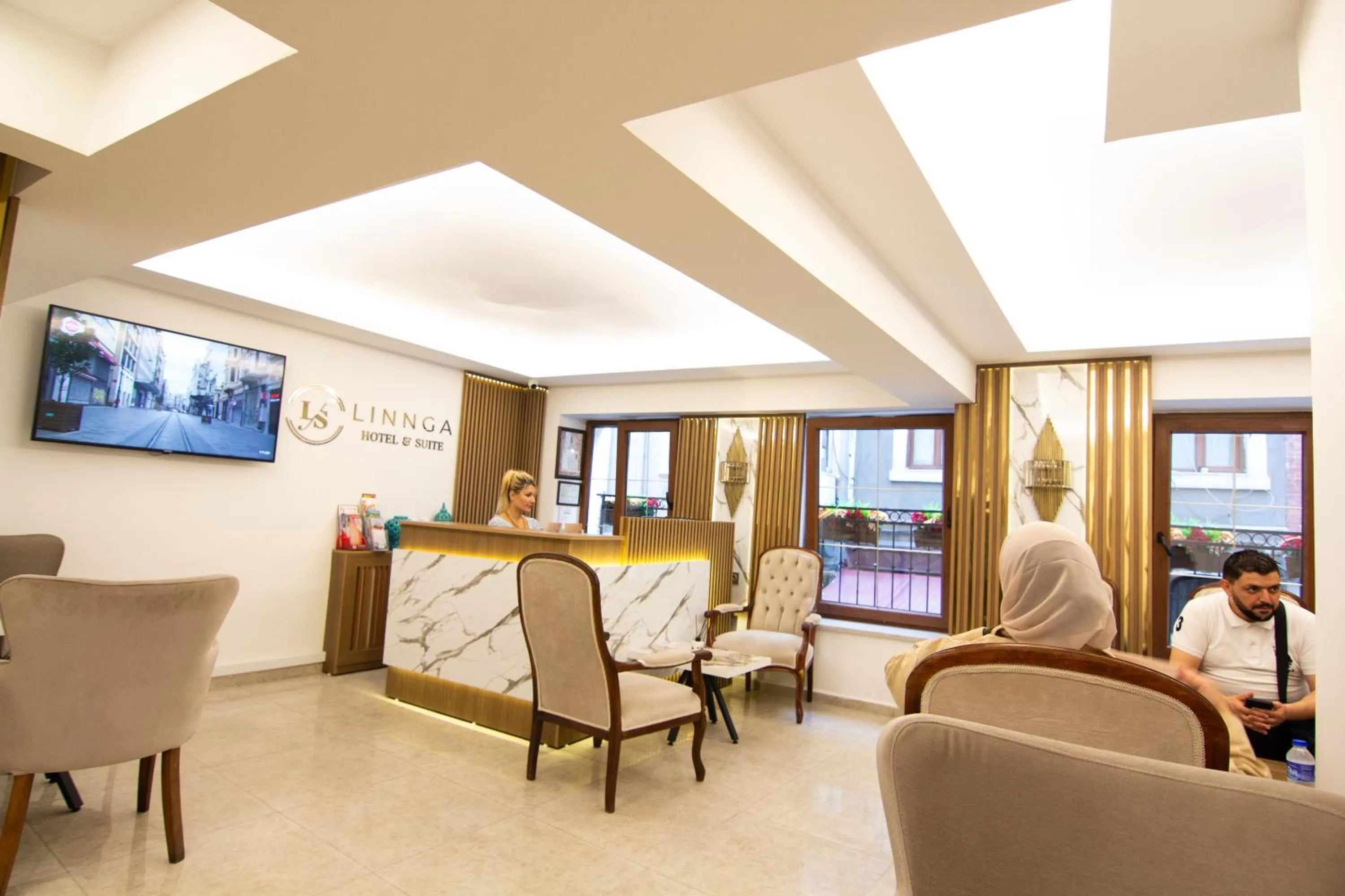 Lobby or reception in LINNGA HOTEL & SUITE