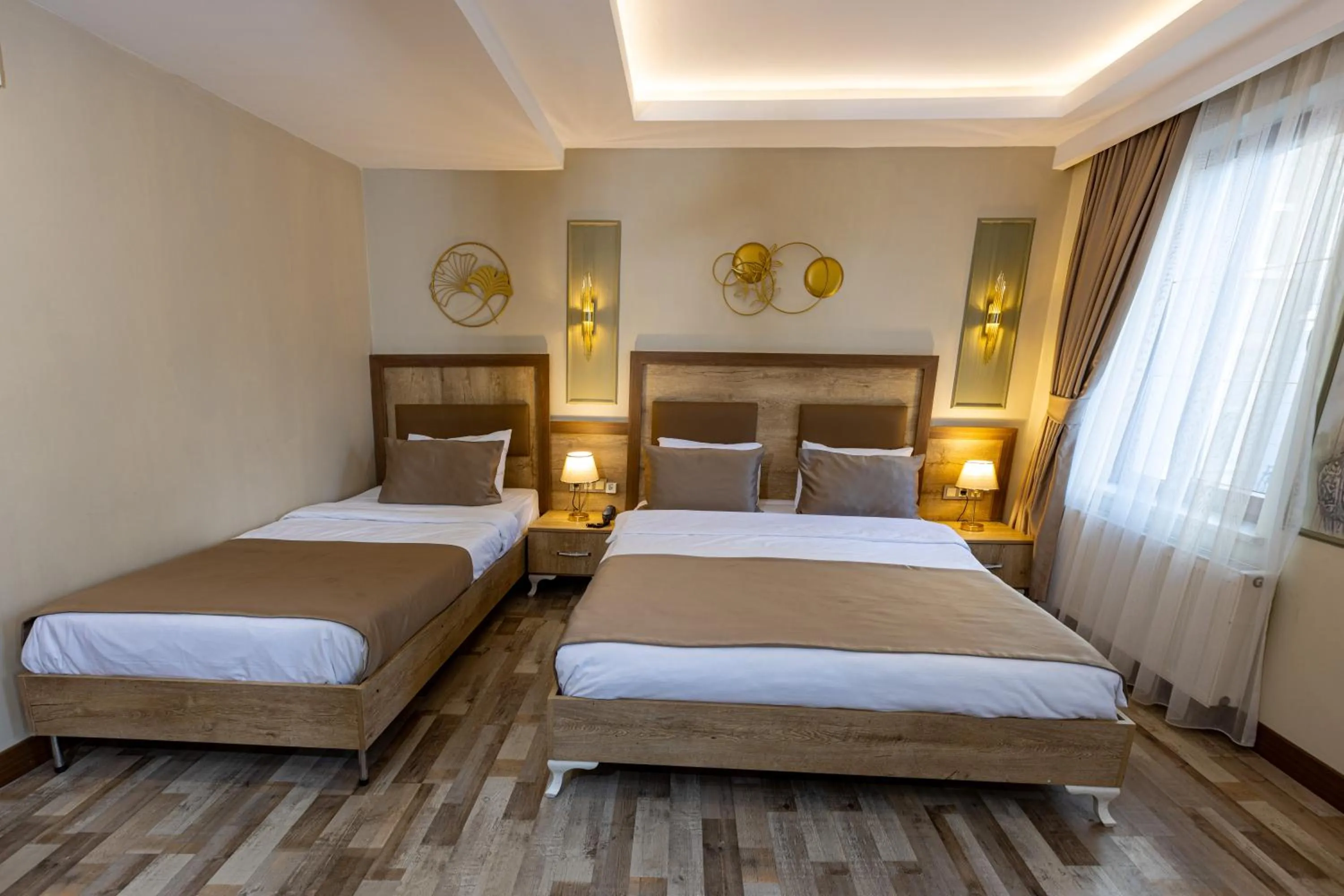 Bed in LINNGA HOTEL & SUITE