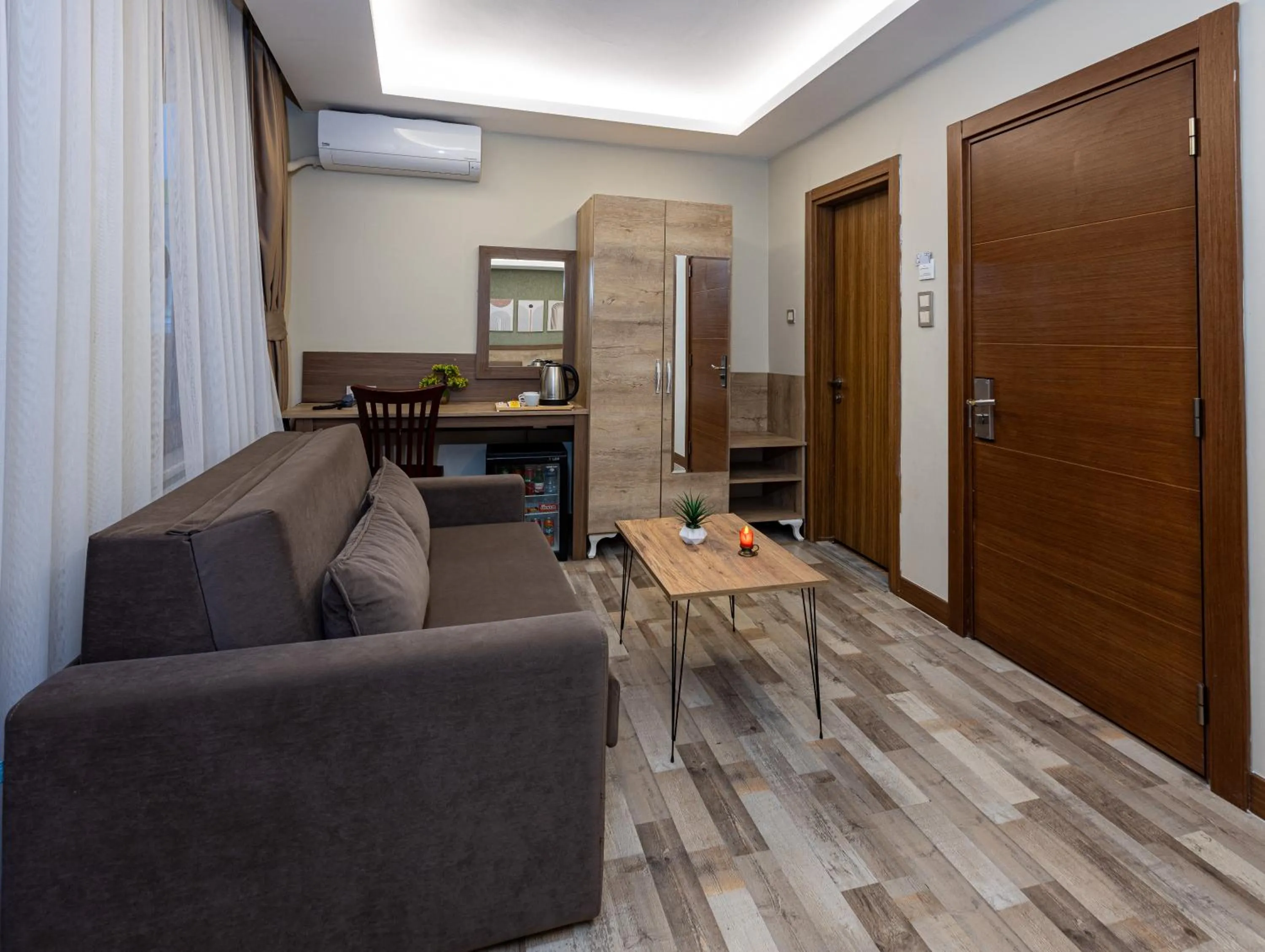 TV and multimedia in LINNGA HOTEL & SUITE