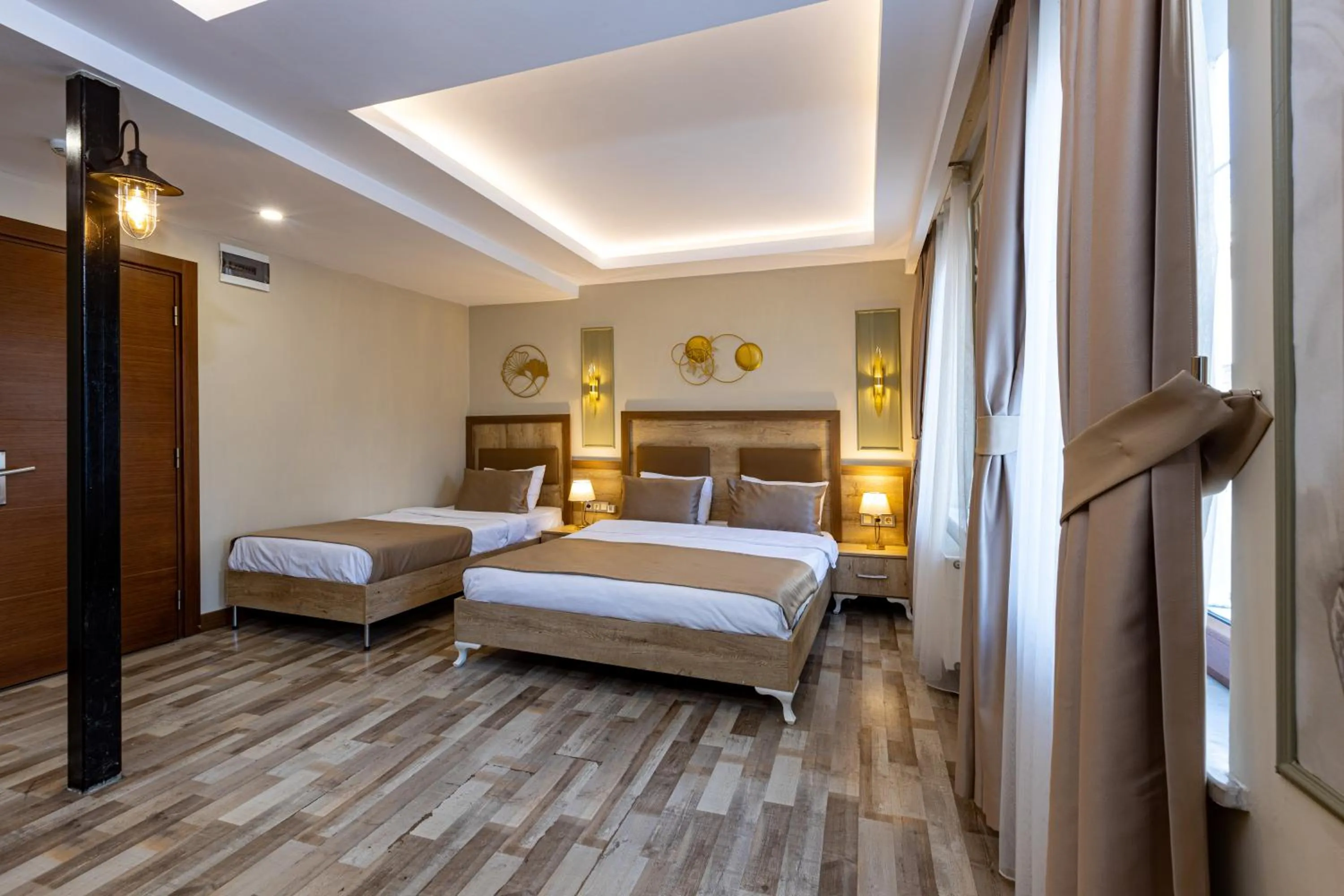 Bed in LINNGA HOTEL & SUITE