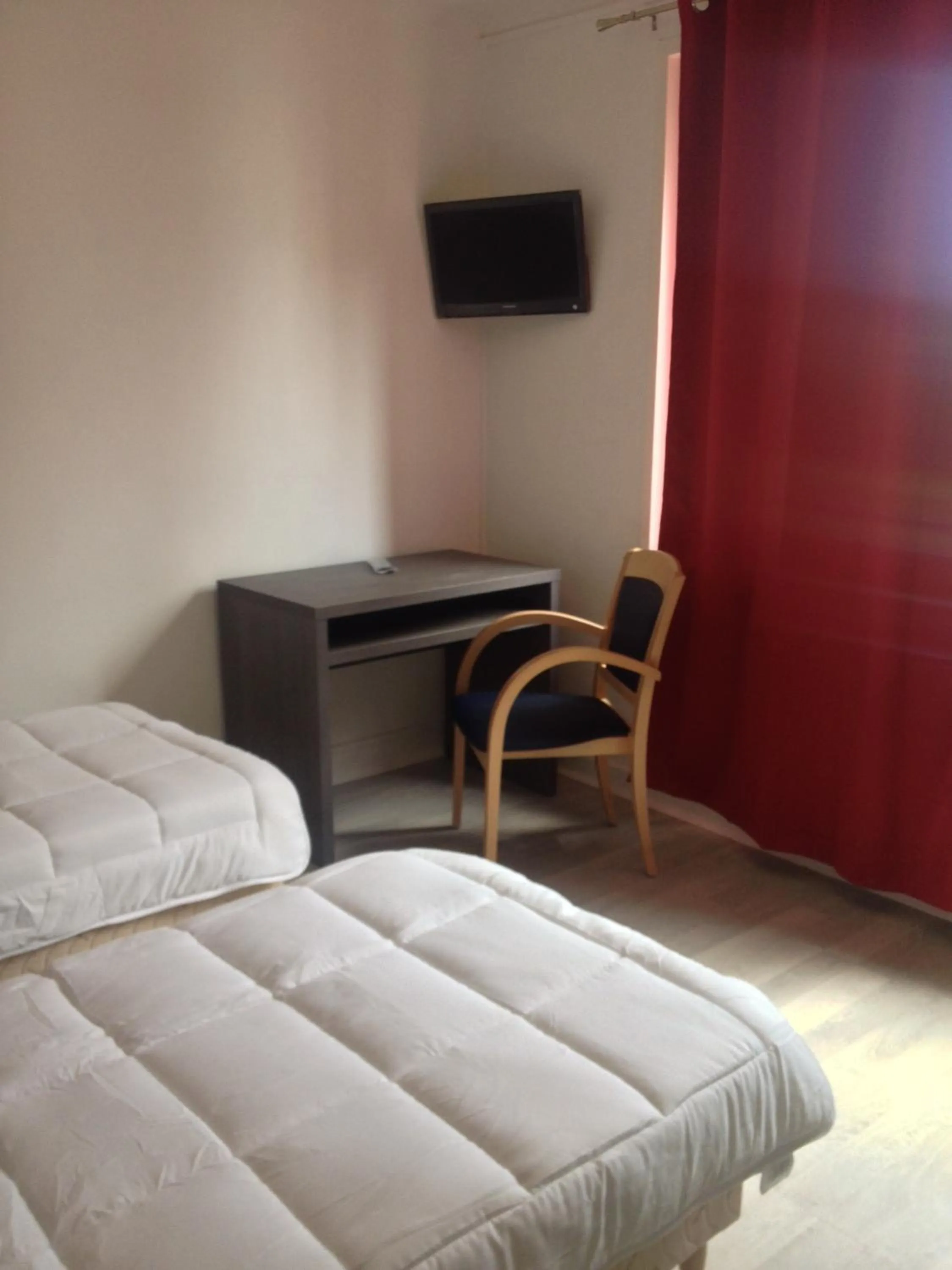 Bed in Hotel Le Jardin