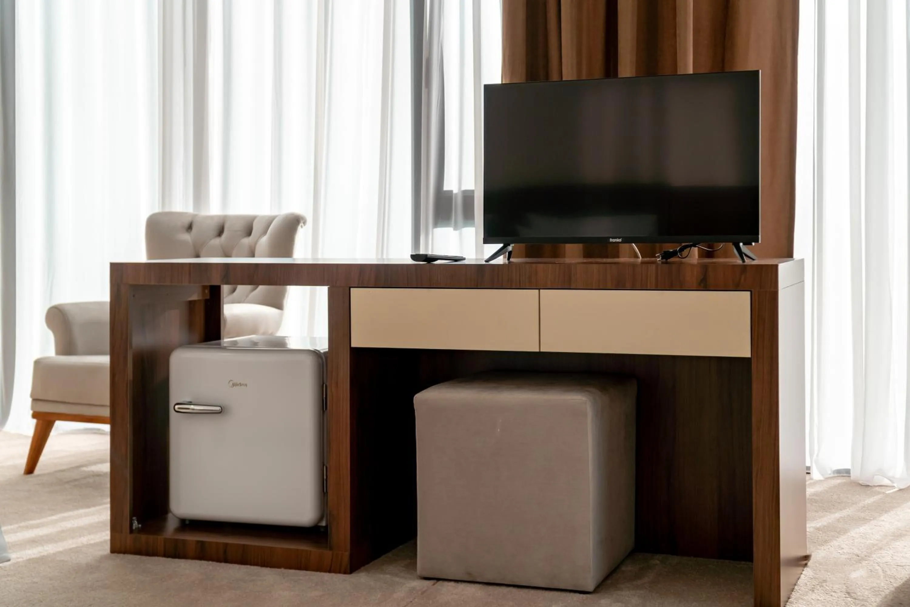 Communal lounge/ TV room in Chateau Milisi