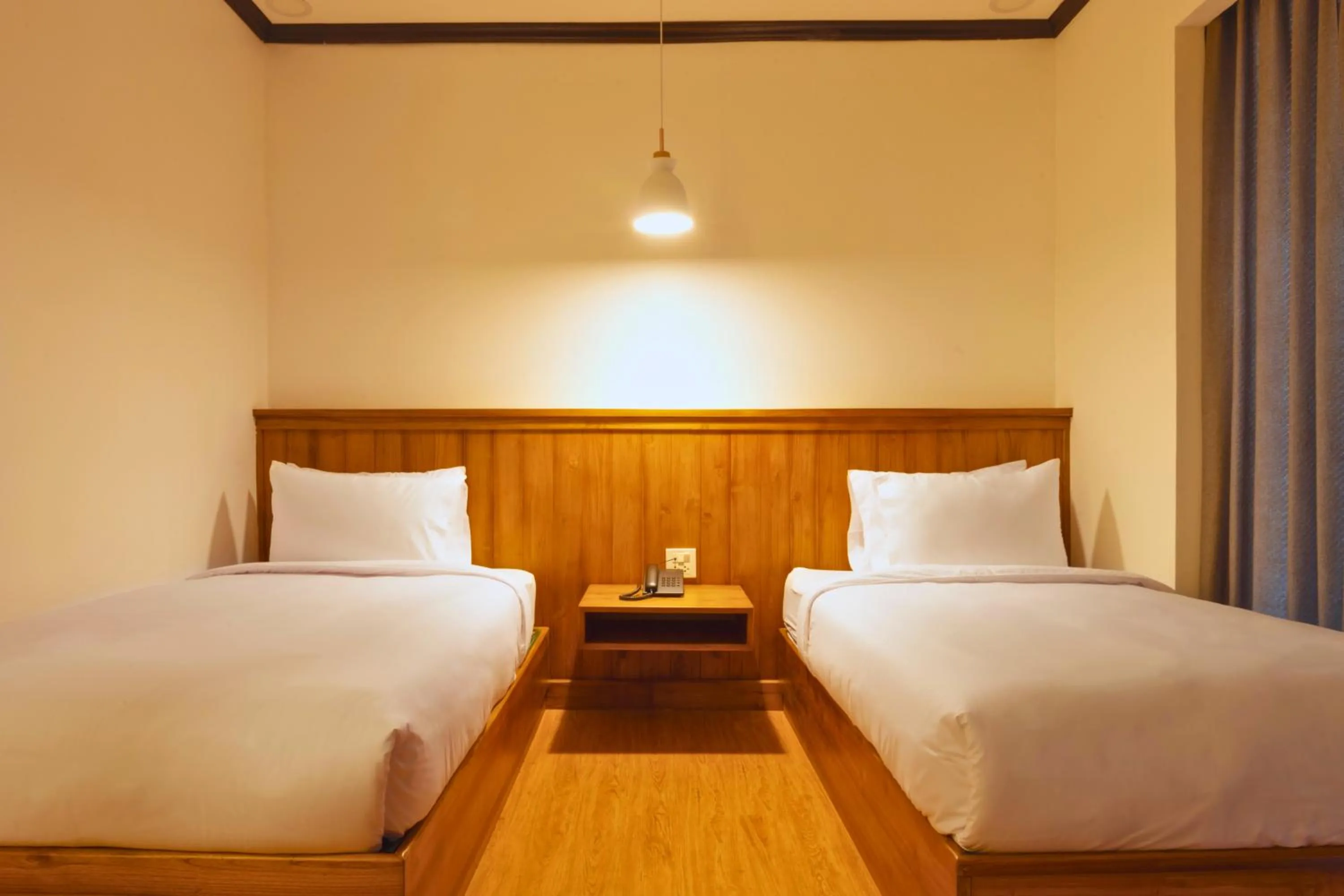 Bed in Oudomsin VangVieng Hotel