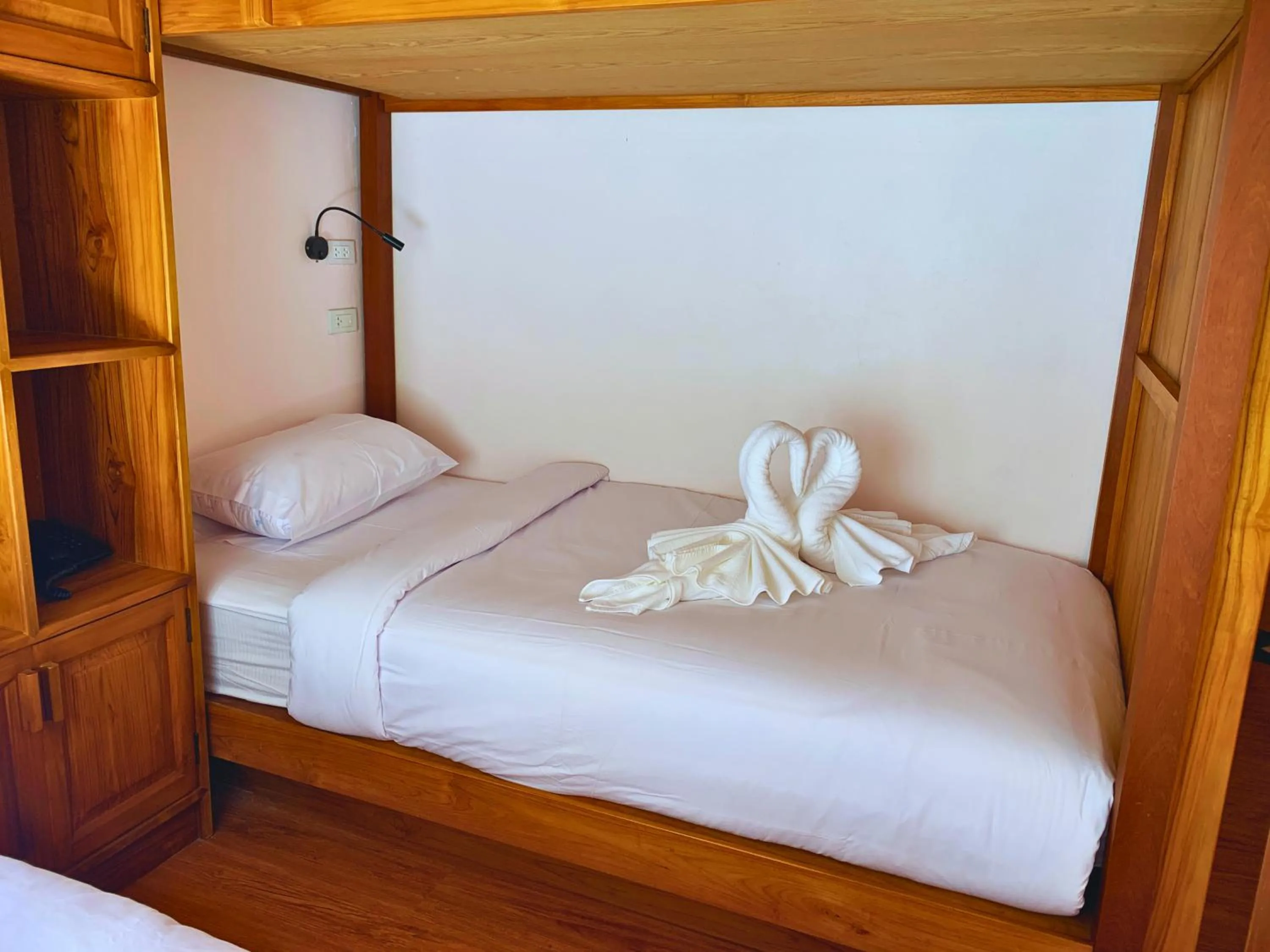 Bed in Oudomsin VangVieng Hotel