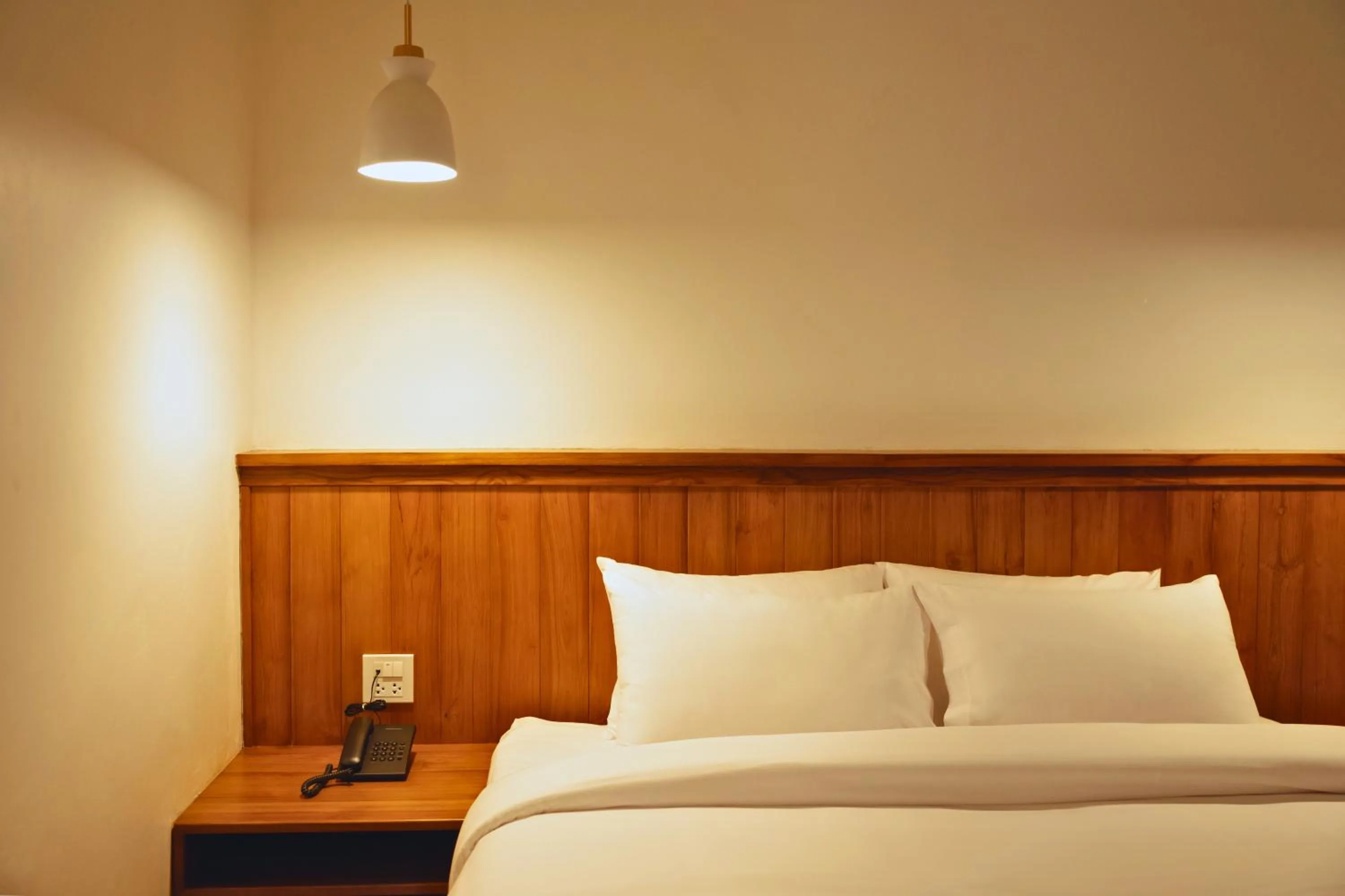 Bed in Oudomsin VangVieng Hotel