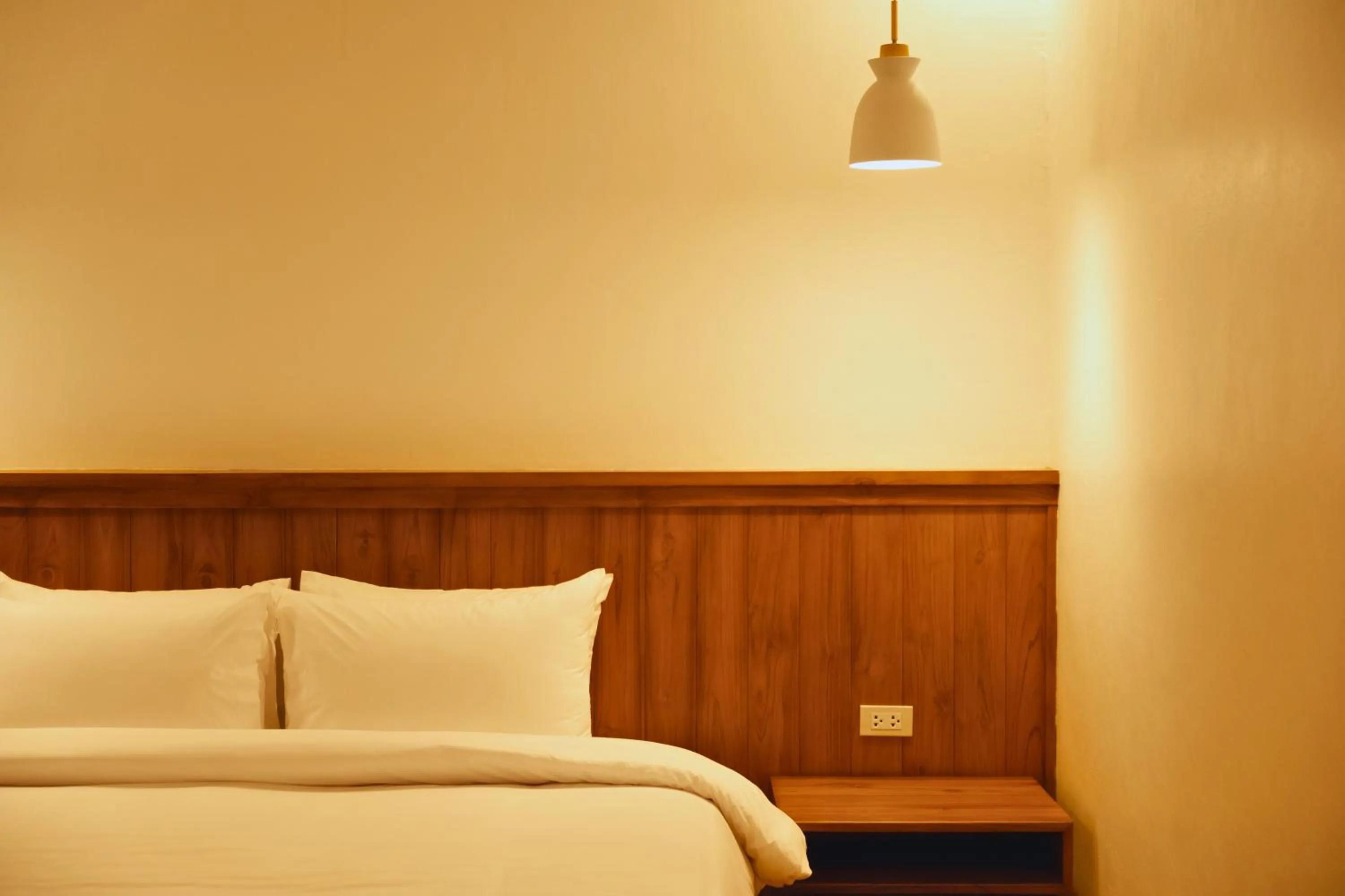 Bed in Oudomsin VangVieng Hotel