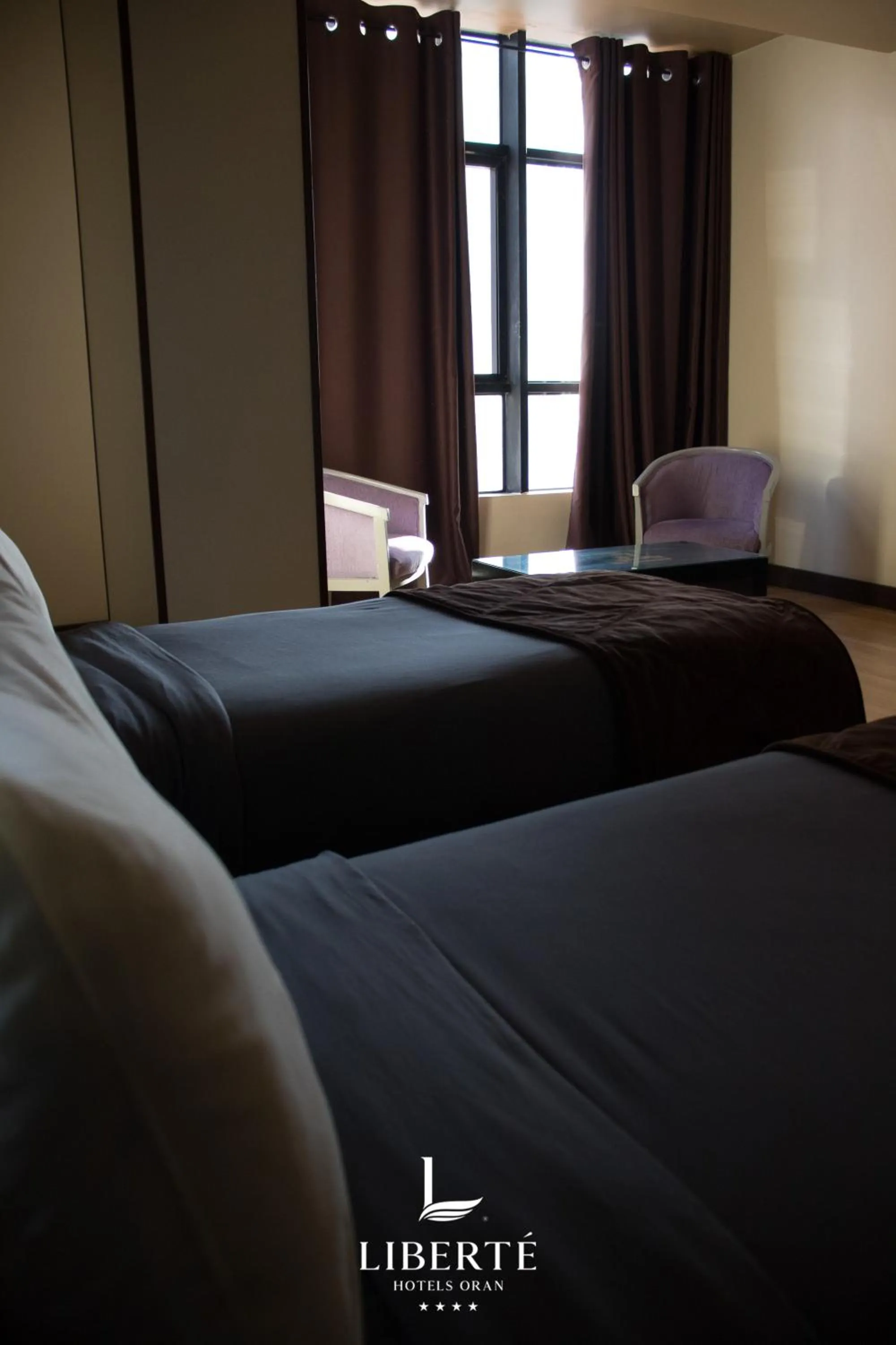 Bed in Liberté Hotels Oran