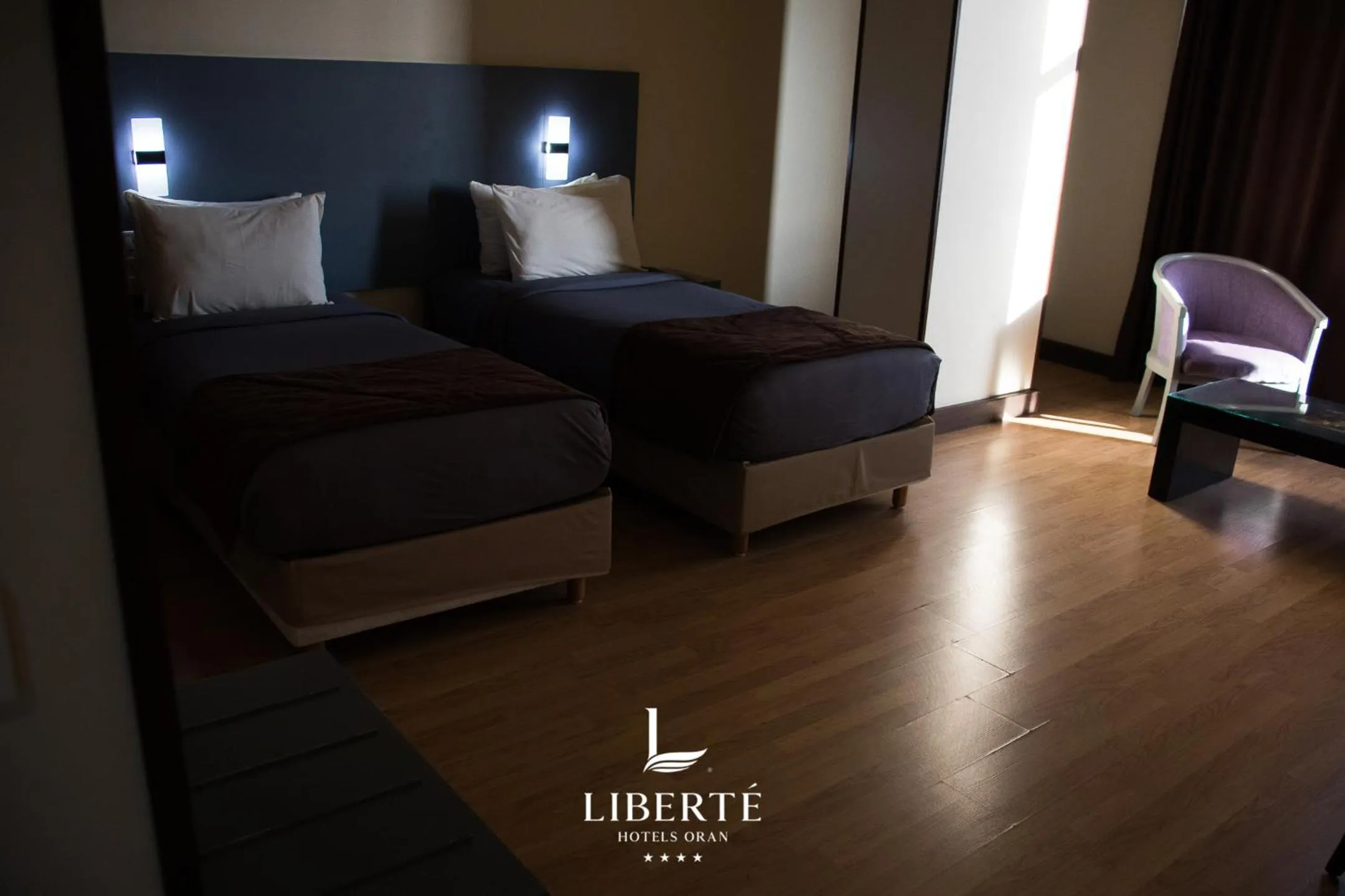 Bed in Liberté Hotels Oran