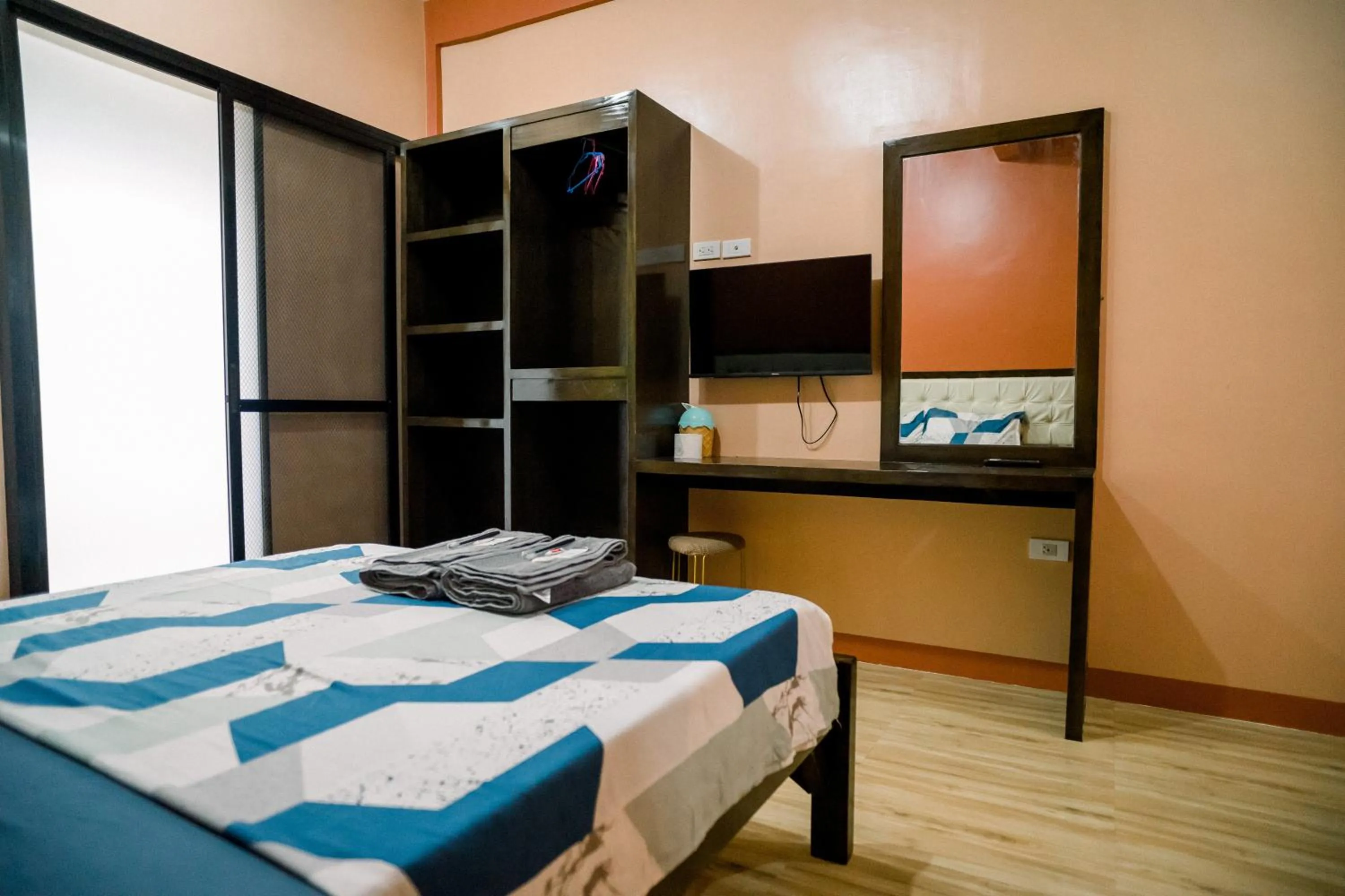 Bed in Alona Princess Suites