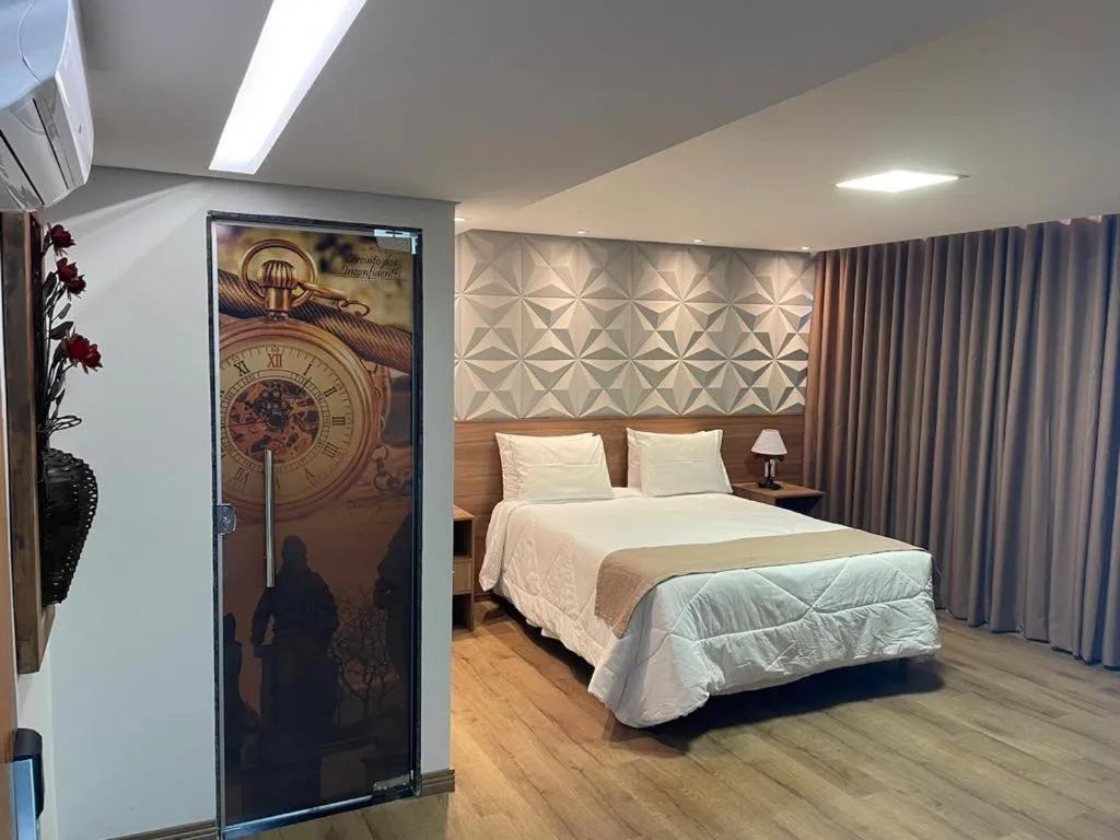 Bed in Pousada Circuito dos Inconfidentes