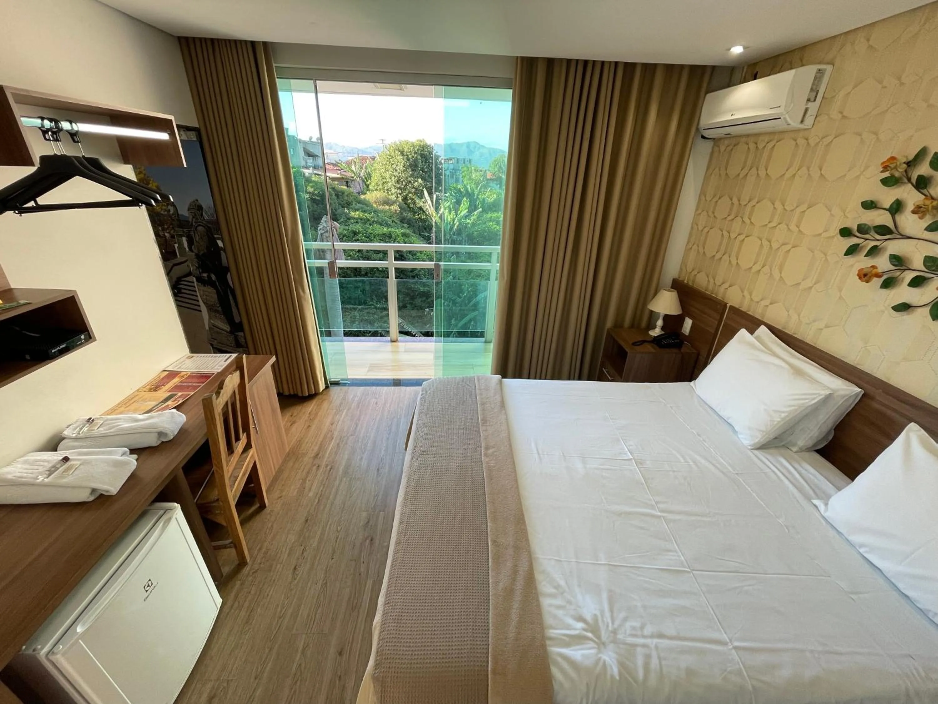 Bed in Pousada Circuito dos Inconfidentes