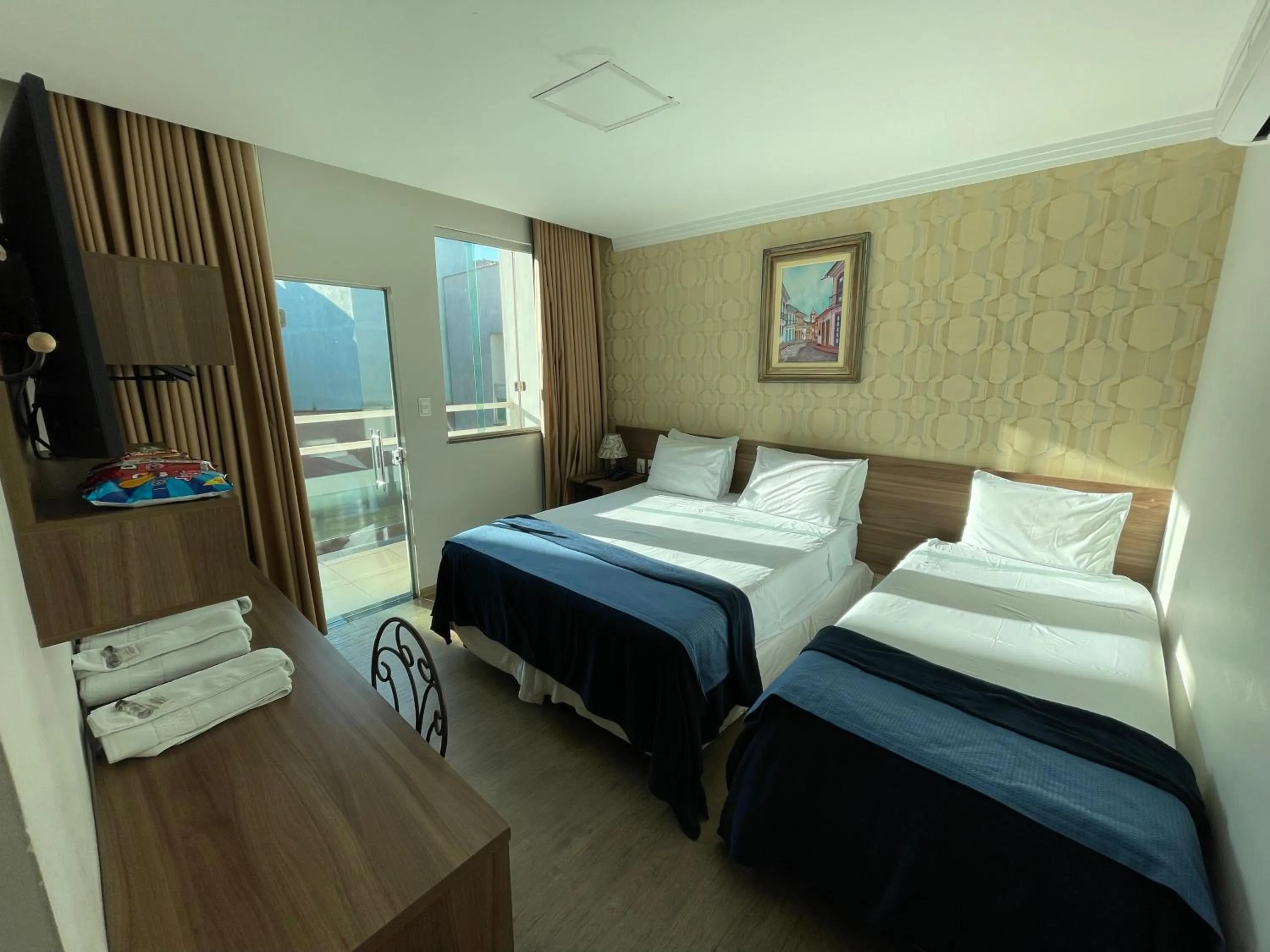 Bed in Pousada Circuito dos Inconfidentes