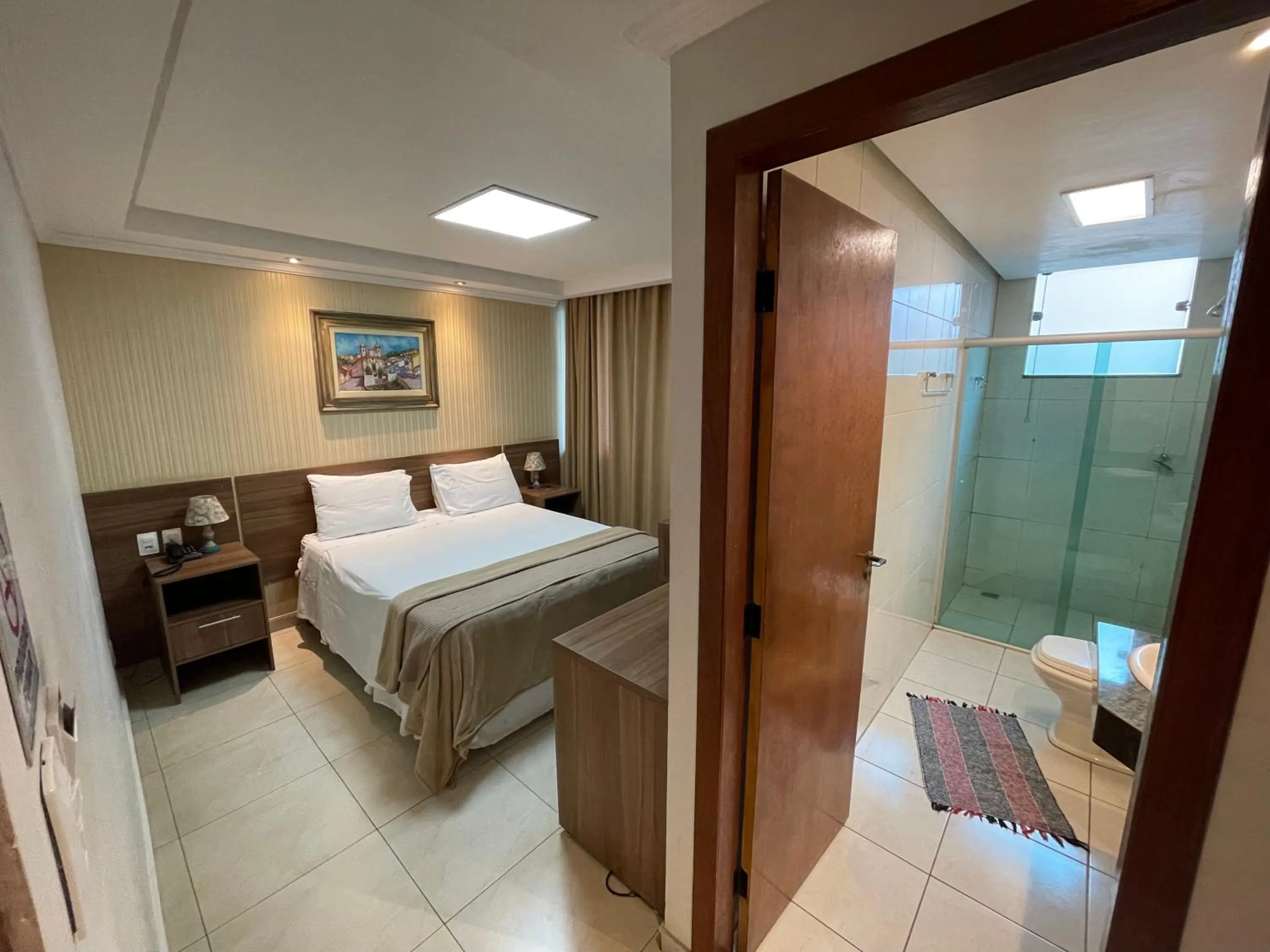 Bed in Pousada Circuito dos Inconfidentes