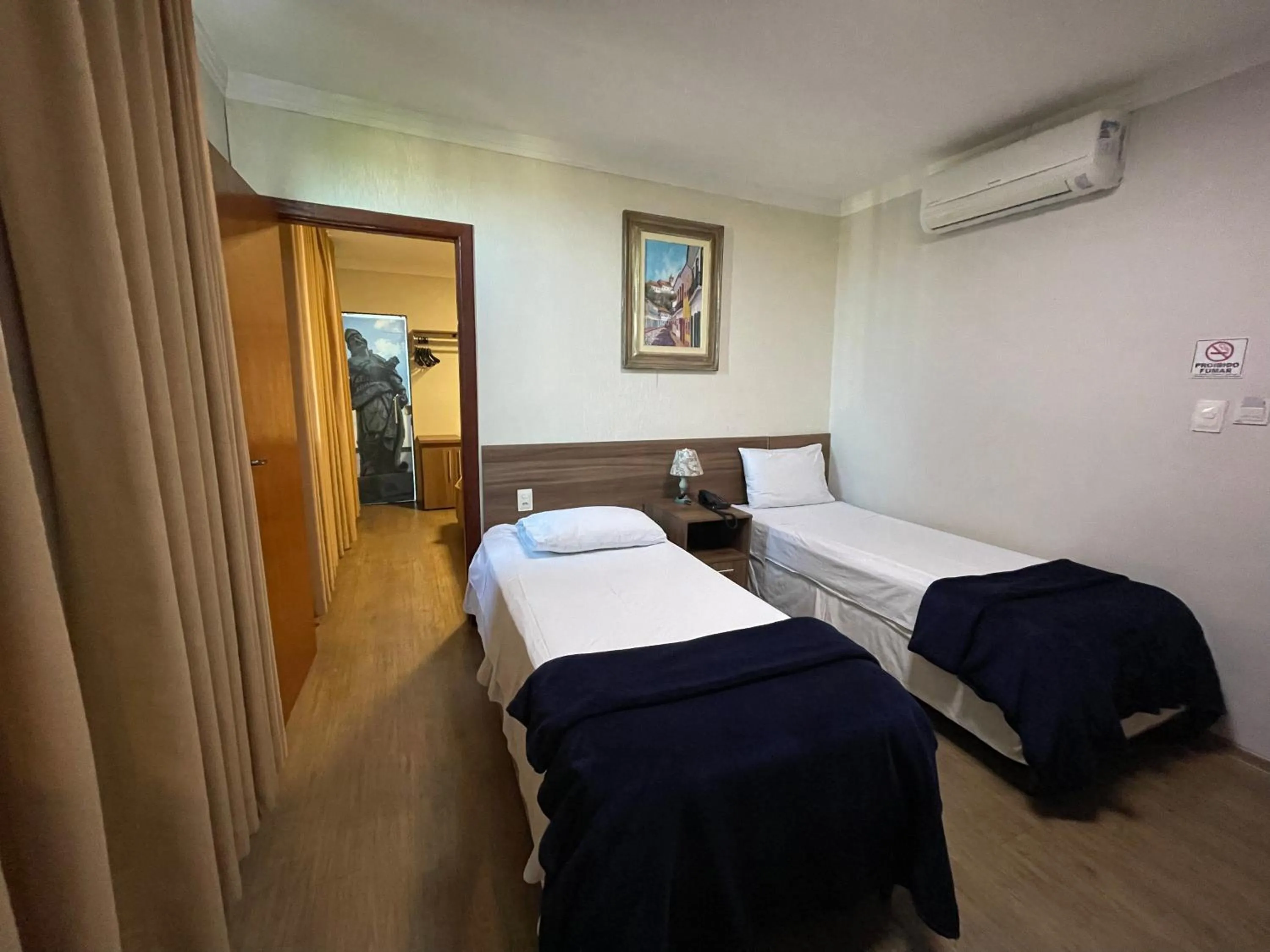 Bed in Pousada Circuito dos Inconfidentes