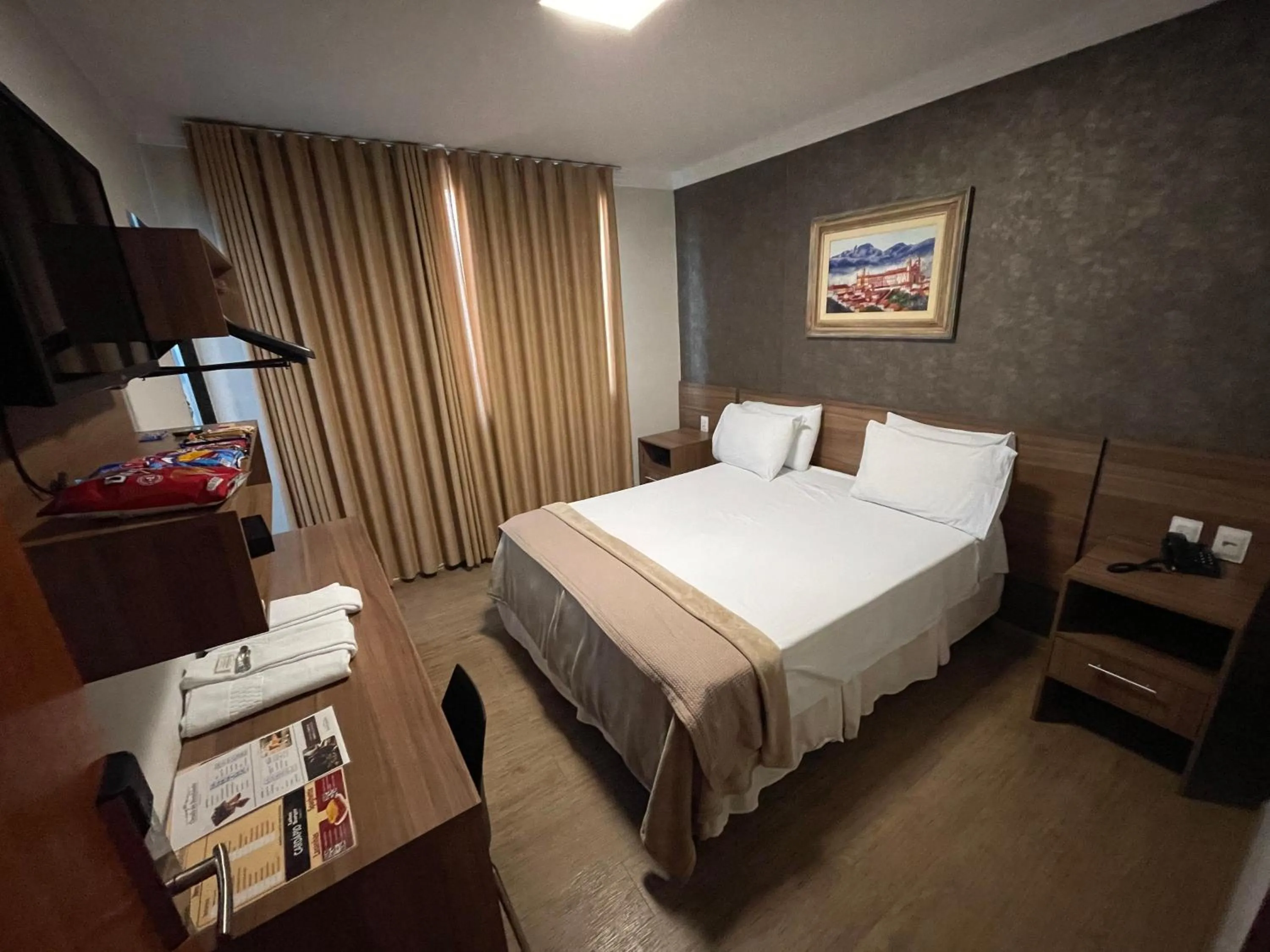 Bed in Pousada Circuito dos Inconfidentes