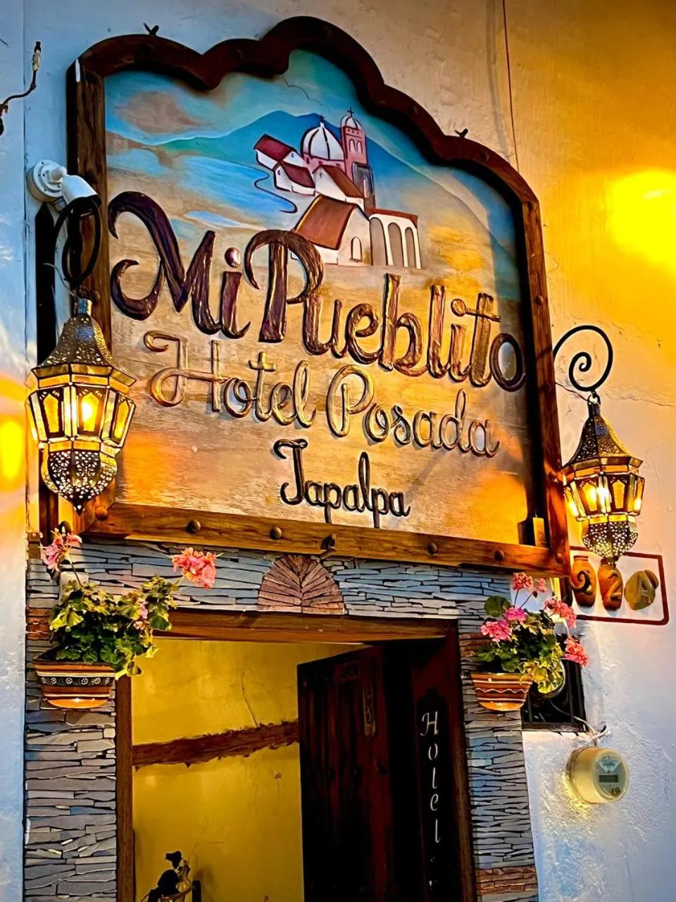 Logo/Certificate/Sign in Hotel Mi Pueblito Tapalpa